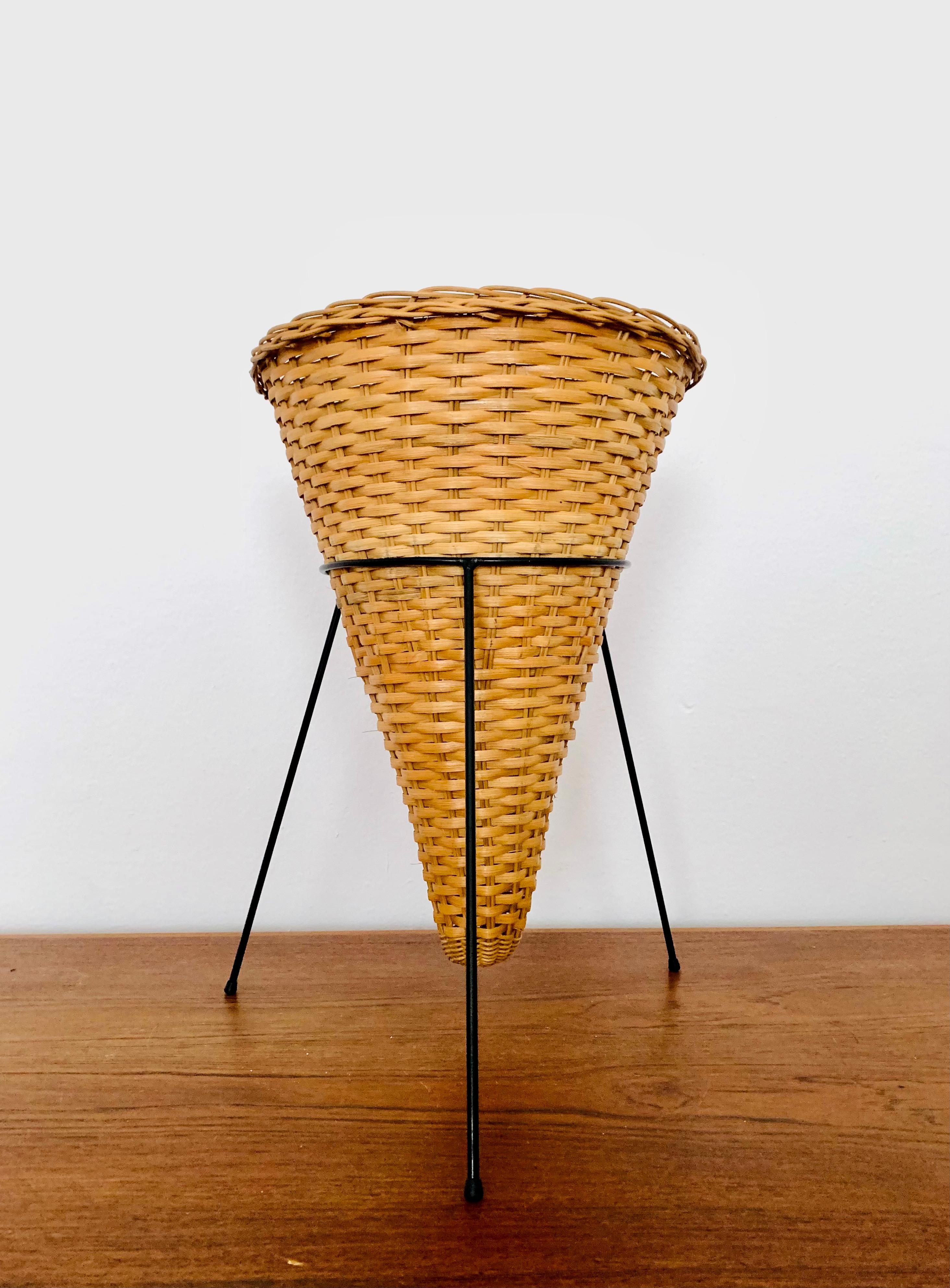 Very nice paper basket or planter from the 1950s.
Loving workmanship and contemporary design.
An enrichment for every home.
Very flexible to use.

Condition:

Very good vintage condition with slight signs of wear consistent with age.
The