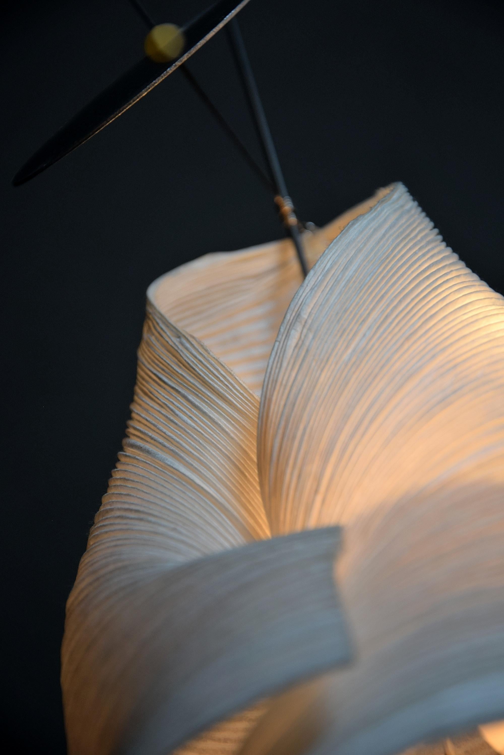 Stunning 1998 table lamp The Tribe : Aikaduli designed by Ingo Maurer and Dagmar Mombach in 1998.
Iconic Ingo Maurer Aikaduli table lamp, designed by Ingo Maurer and Dagmar Mombach. This lamp is a work of art. It is made of hand-folded paper, metal,