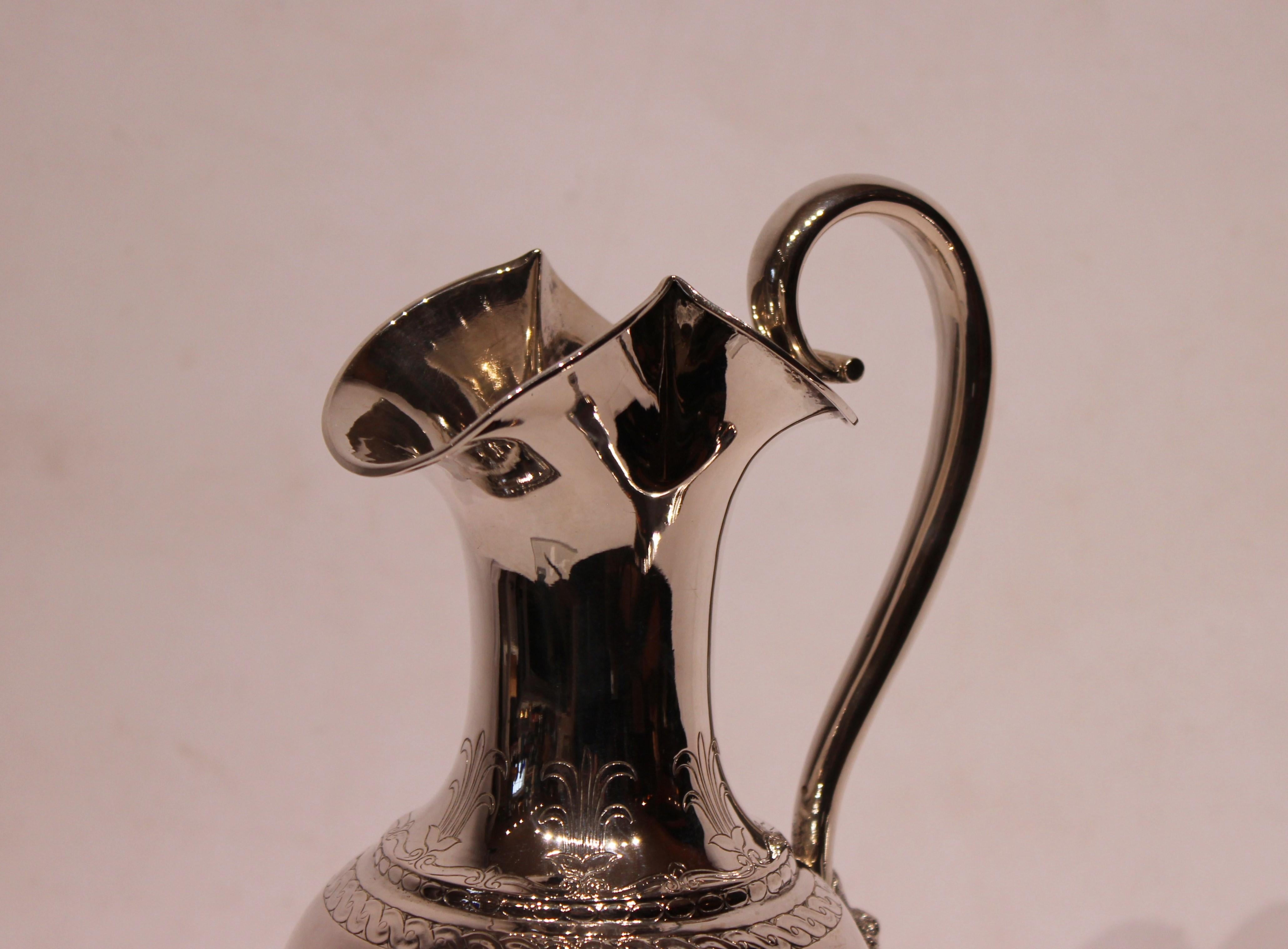 Water jug beautifully decorated of hallmarked silver. The jug is in great vintage condition.