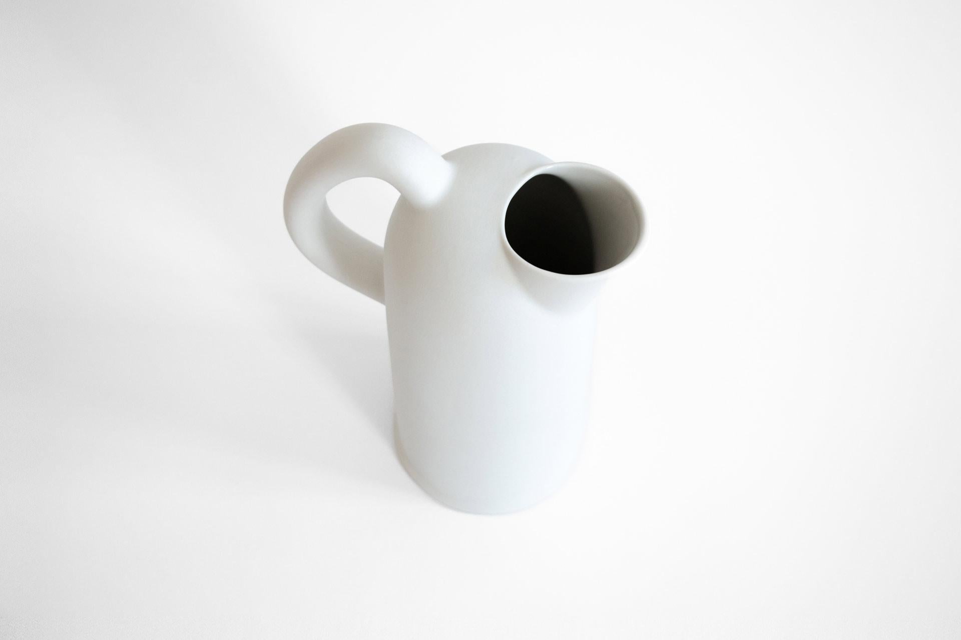Water jug made of clay that reinterprets the historic typology with an upright profile and ergonomic handle. To encourage the user to consume tap water instead of from plastic bottles, Jug is a beautiful daily use object that never needs to be