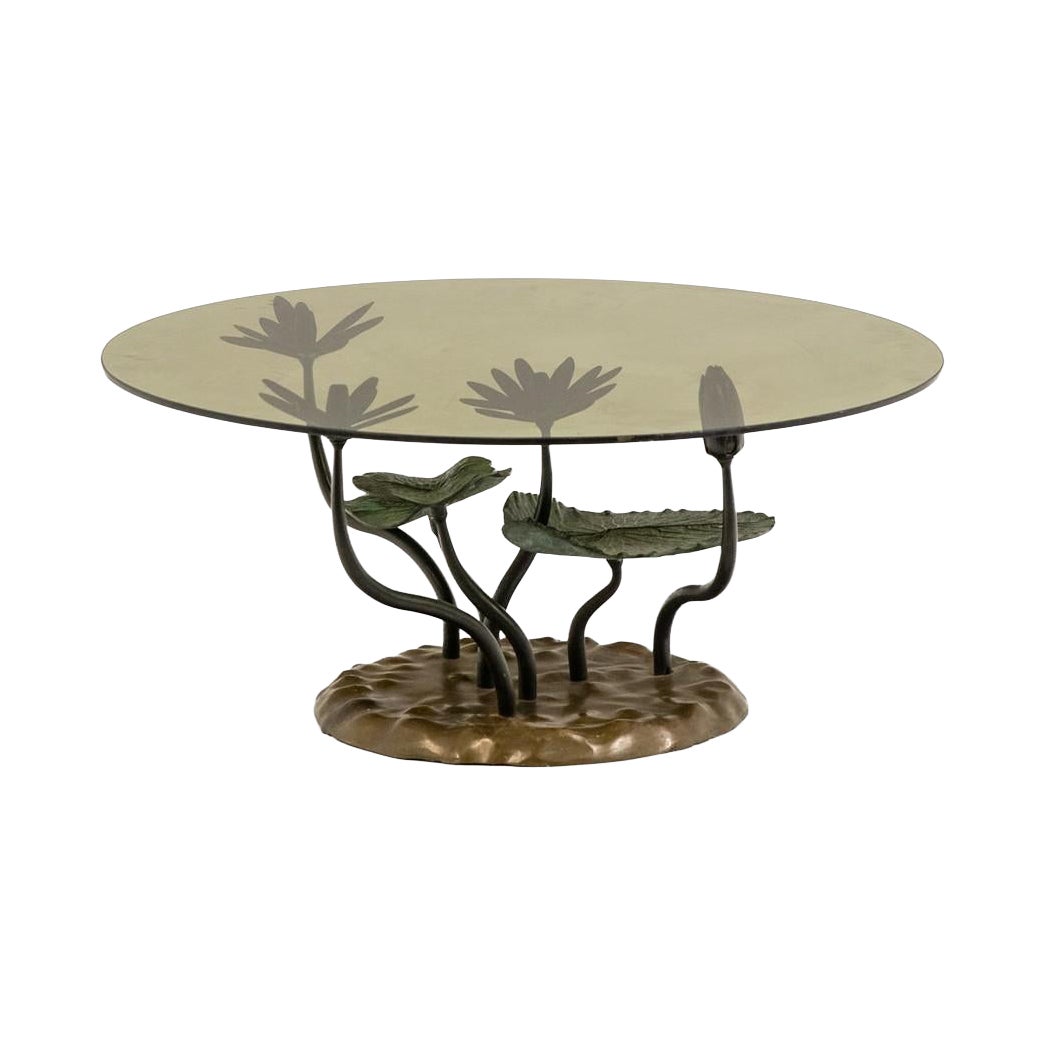 “Water Lily” coffee table in bronze with two patinas. 1970s.