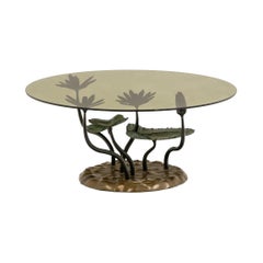 “Water Lily” coffee table in bronze with two patinas. 1970s.