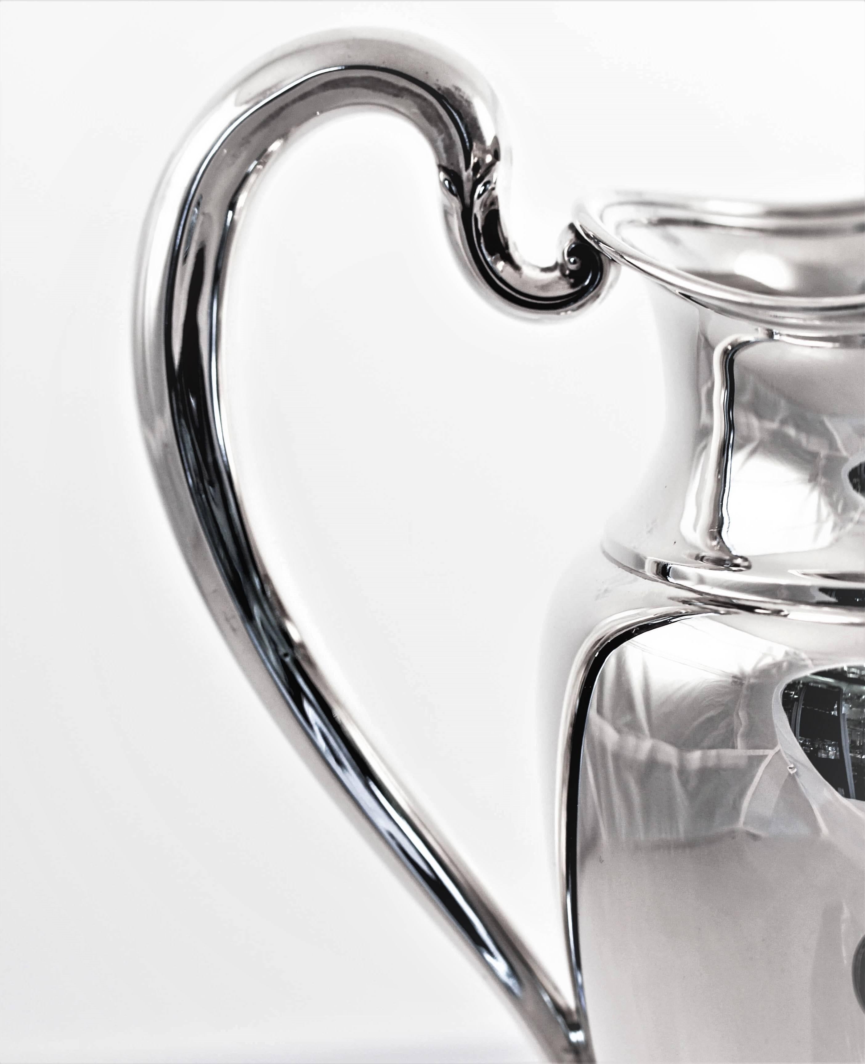 international silver company water pitcher