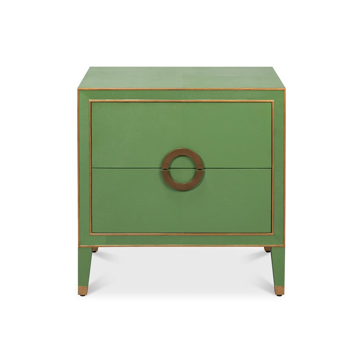 This piece combines functionality with unparalleled style, creating a statement of transitional elegance.

The standout feature of this nightstand is the rich, vibrant green hue that perfectly contrasts with the elegant golden accents, bringing a