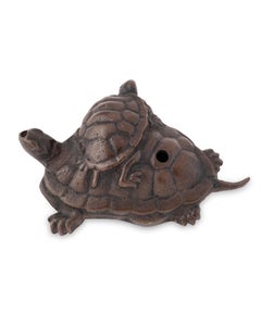 Waterdropper or suiteki in bronze in the form of a group of turtles