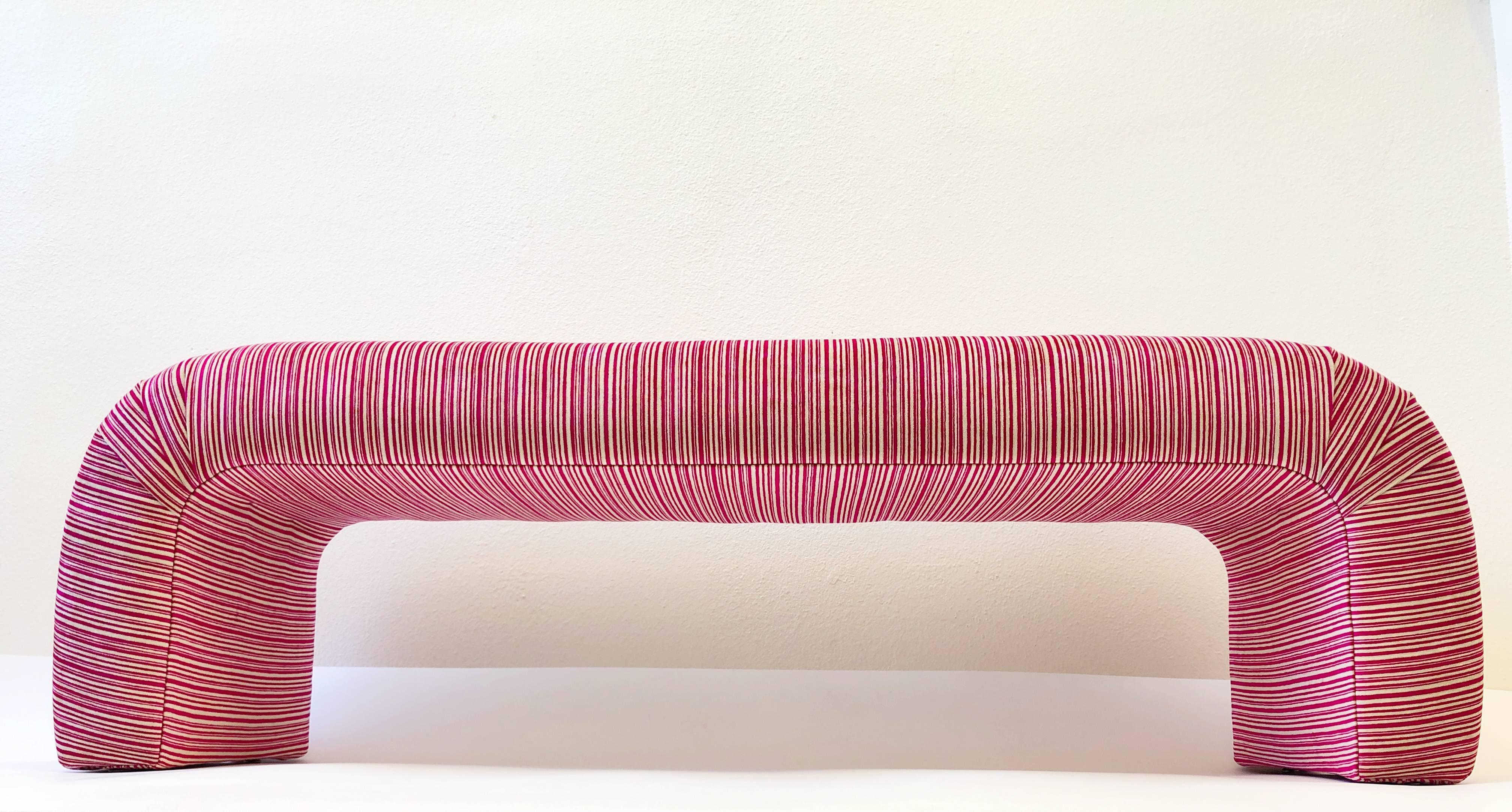 A glamorous 1980s newly reupholstered waterfall bench by Steve Chase.
The bench has been upholstered fushia and off-white striped soft velvet (see detail photos). If you wish to have it recovered n a different fabric? Lease let us