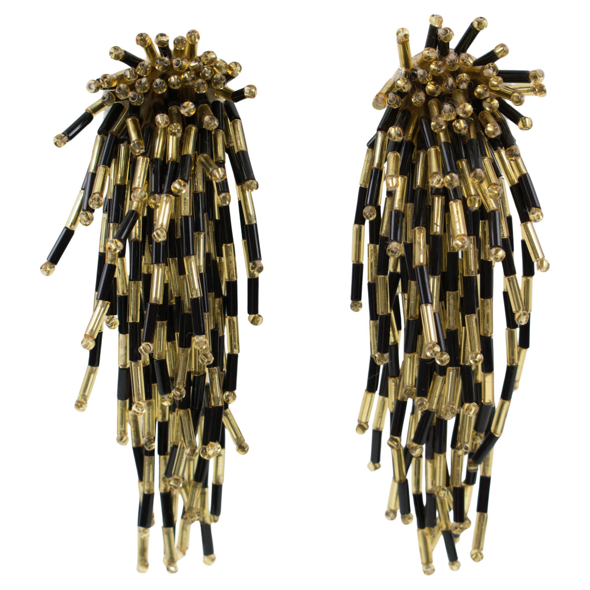 Orecchini a clip con perline in vetro nero e oro a cascata in vendita