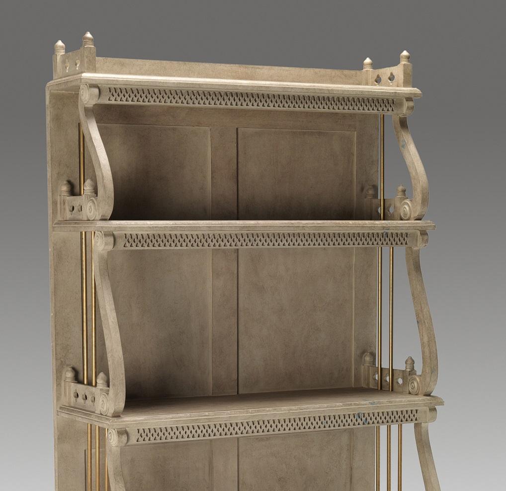 A pair of five-tier waterfall bookcase of tapering form with blind fret and open fret decoration, the ends inset with brass retaining rods. Finished in an aged stone paint with light distressing.

We are currently working to a 30-36 week lead time.