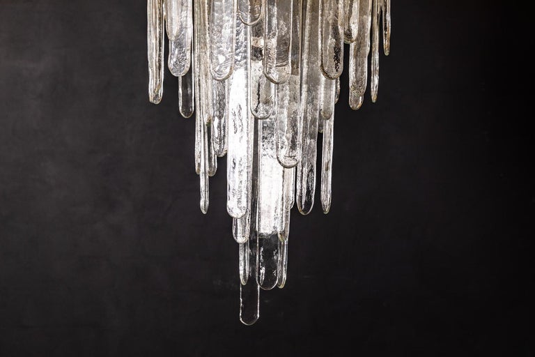 Waterfall chandelier design by Carlo Nason and produced by Mazzega in 1946. The 'piastra' technique used to create each Murano droplet is very labour intensive with each piece shaped by hand.
 