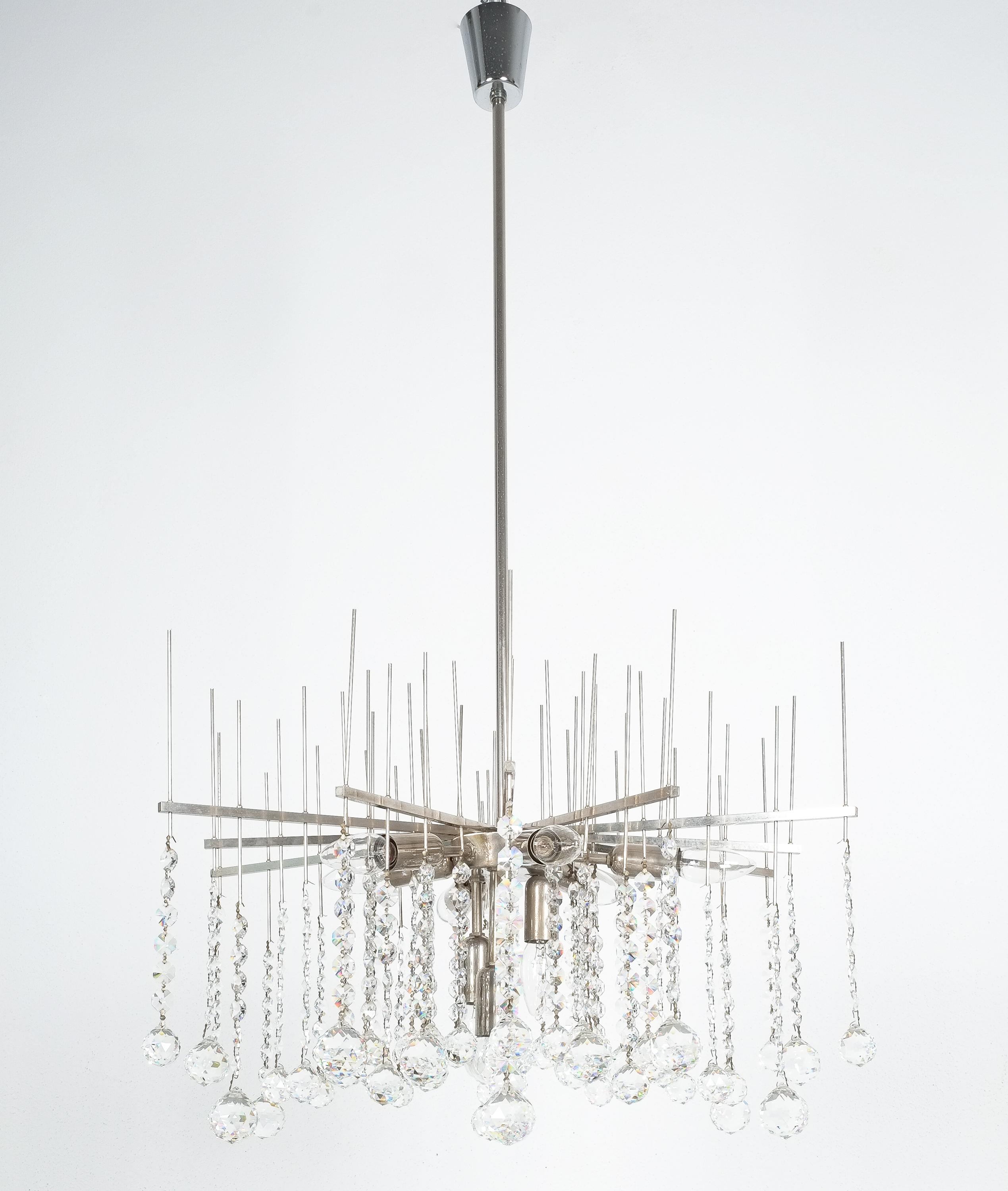 Large waterfall chandelier by J.T. Kalmar with a diameter of 27