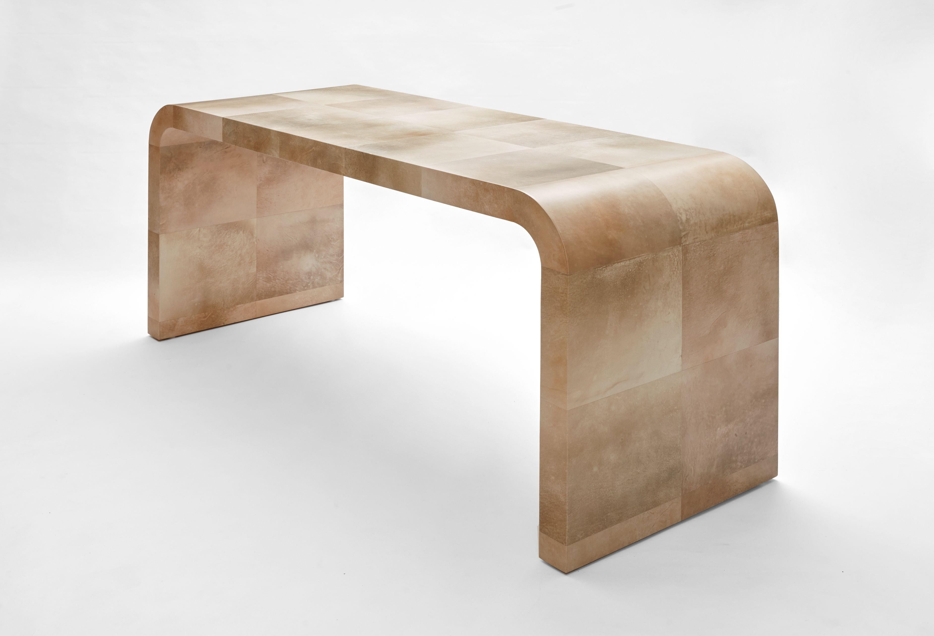 Jean-Michel Frank inspired console table in parchment by Simon Orrell Design
Measures: Width 160cm Depth 58cm Height 75cm
Finish: Parchment - Goat Skin
Made bespoke with a 12 - 14 weeks lead time. 

A timeless design beautifully crafted by