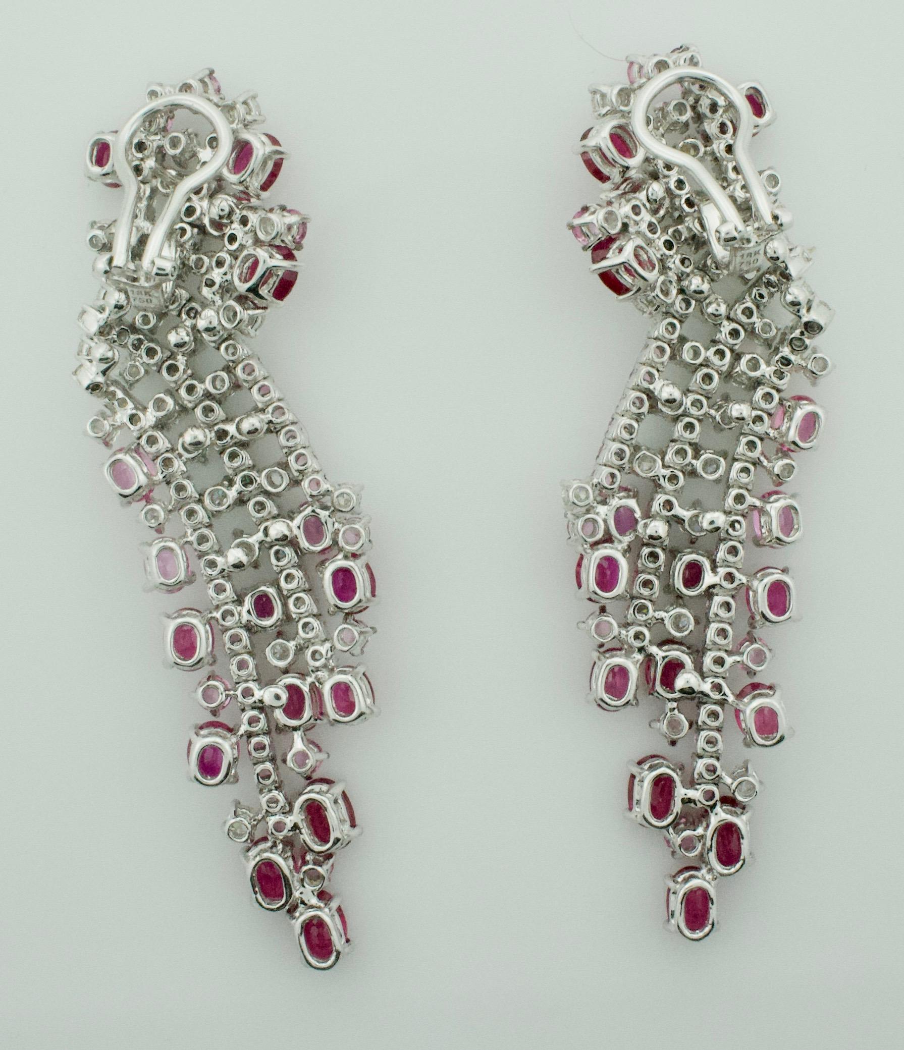 Oval Cut Waterfall Ruby and Pink Sapphire Diamond Earrings For Sale