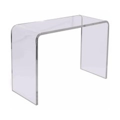 Tavolo consolle in stile cascata in lucite e bordi a toro
