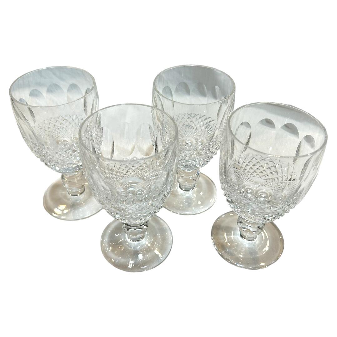 Excellent condition ~ like new! beautiful clear crystal features oval shapes and crisscross shape; multifaceted stem with plain footed base; etched Waterford on bottom; made in Ireland; does not come in original box

2.5”dia. x 4.75”h