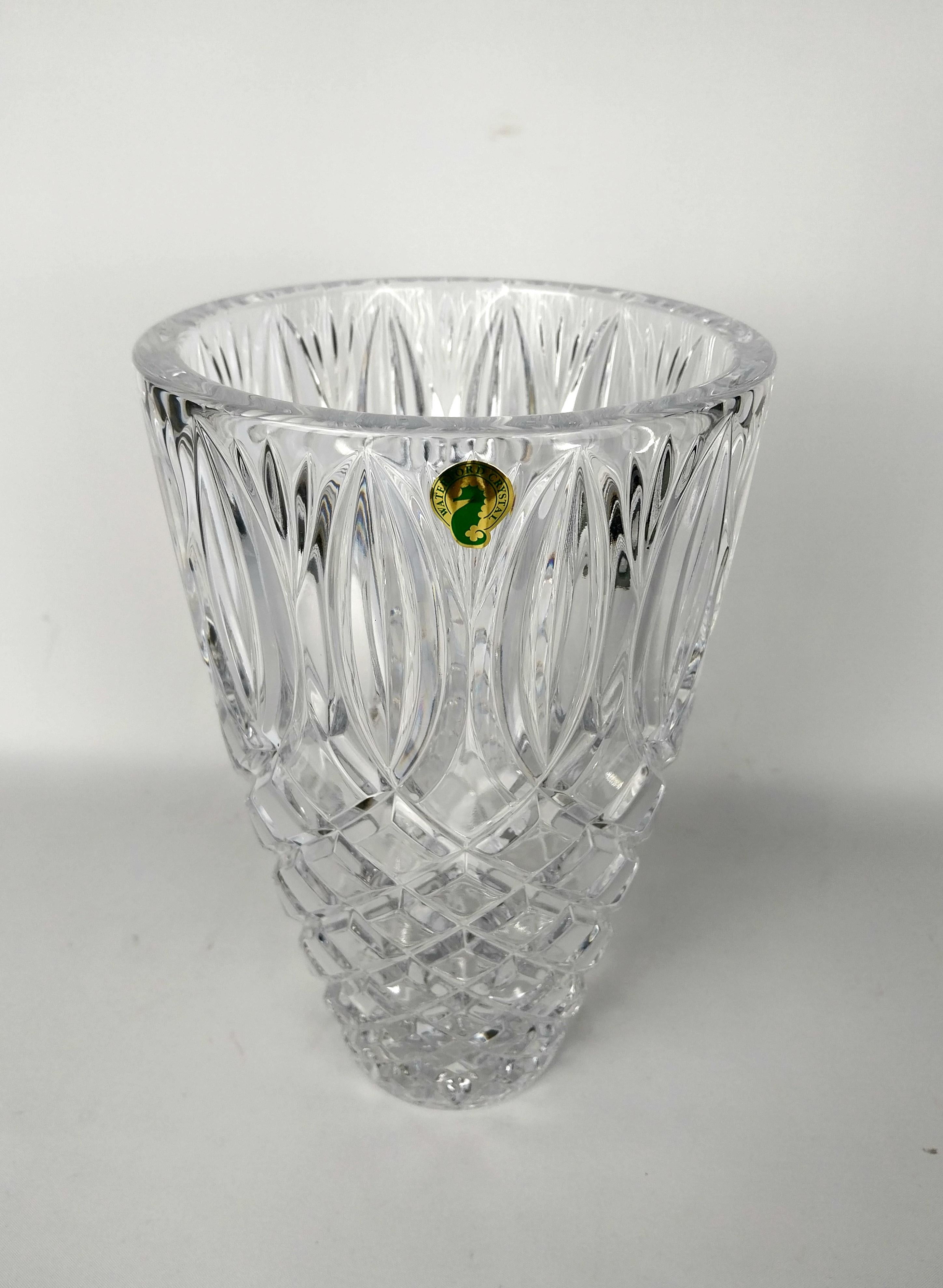 Elegant cut crystal vase in Grant pattern standing 25cm in height and is signed in etching on the bottom and also having the Sea horse motif on the side label.
The Grant pattern is one of Waterford's most distinguished designs; it features