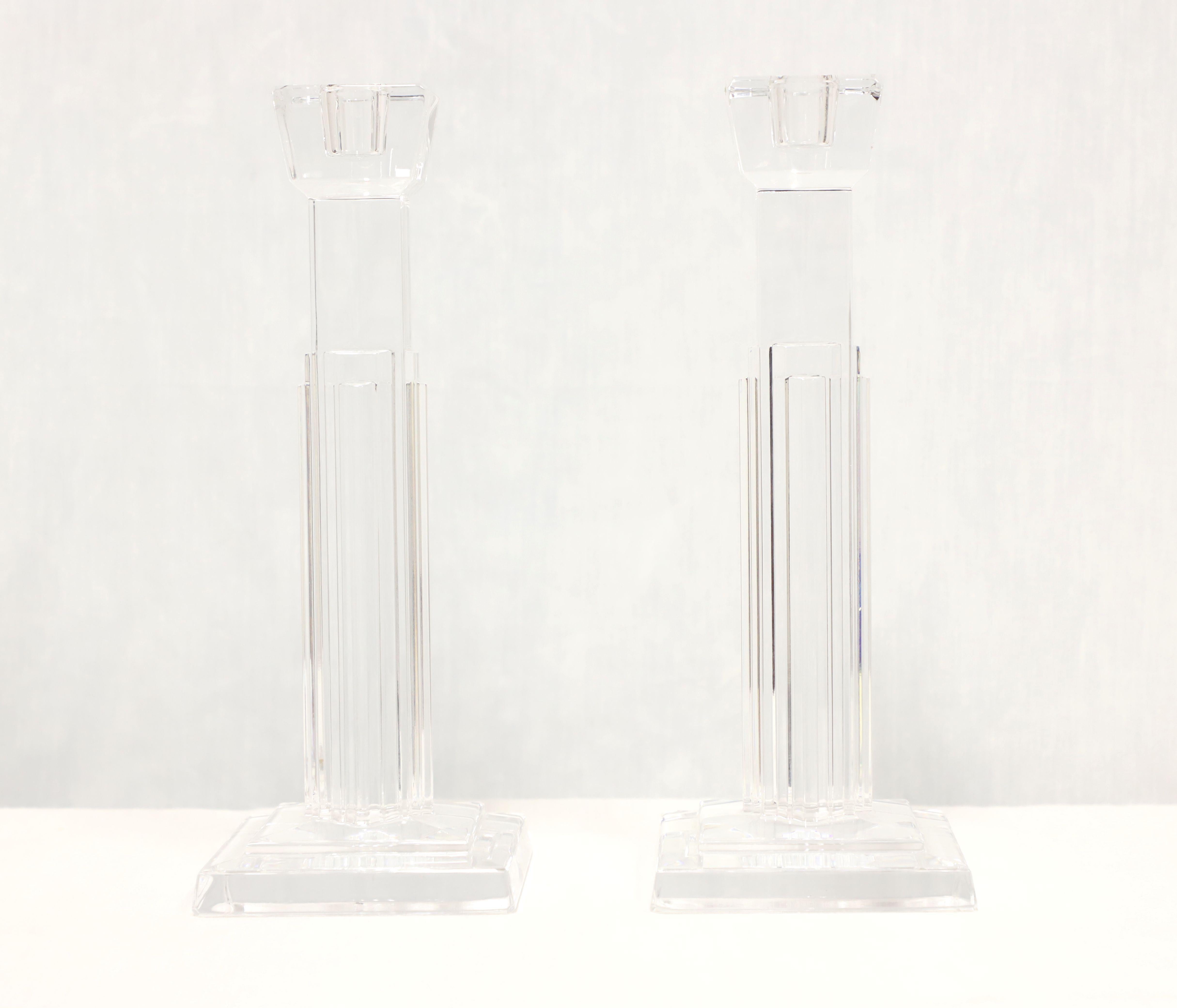 A pair of Late 20th Century candlesticks by Waterford, their 