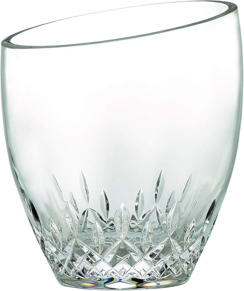 Waterford Crystal Lismore Essence Ice Bucket with Tongs Box. 

Waterford Lismore Essence is the next generation of the classic Lismore pattern, retaining the brilliance and clarity of Lismore, while incorporating a more slender, modern profile. M30