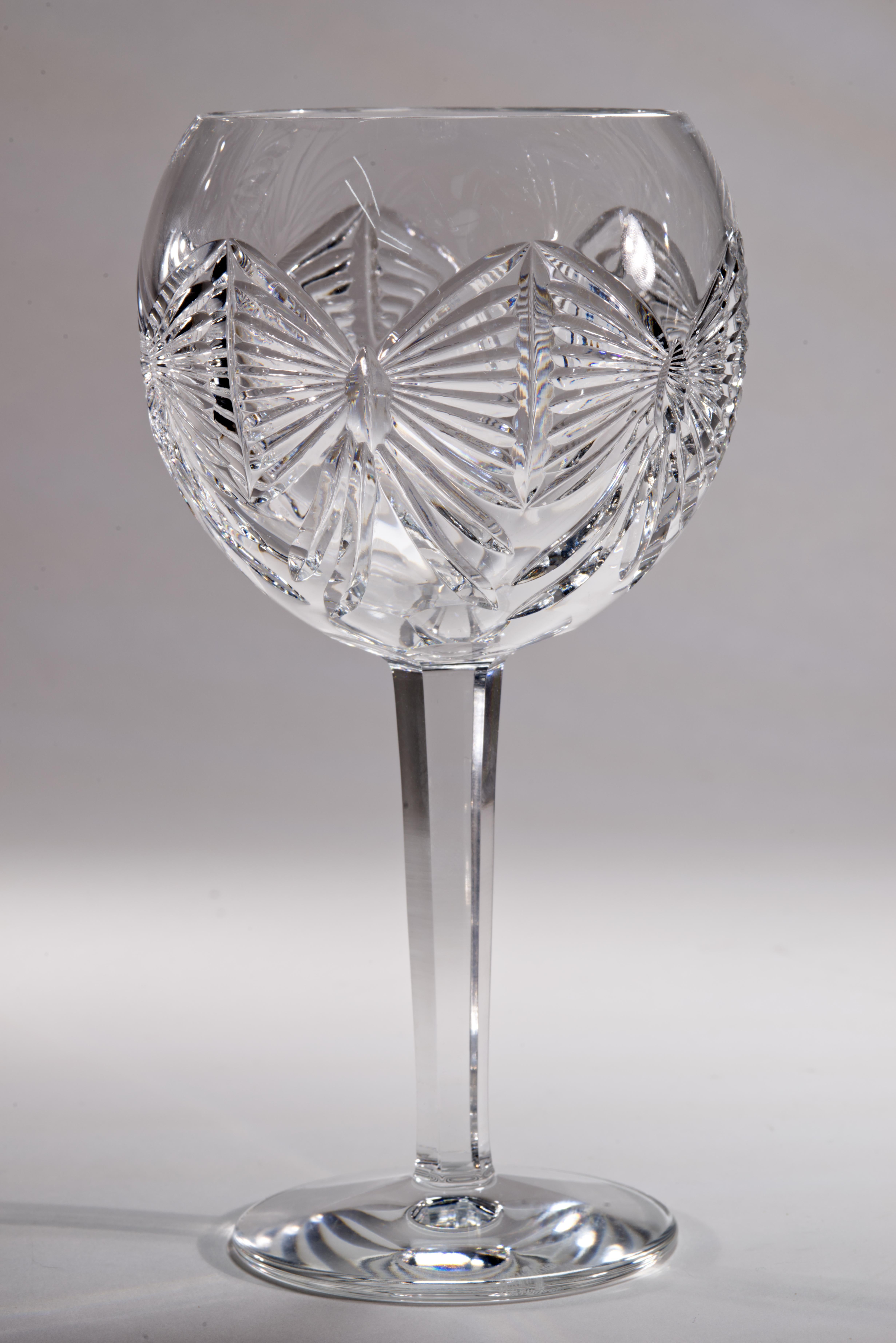 Millennium Series by Waterford Crystal was manufactured from 1996 to 2005, and is now discontinued. It features five different designs for various toasts for the Millennium. 

The pair of large vintage toasting glasses feature the commemorative