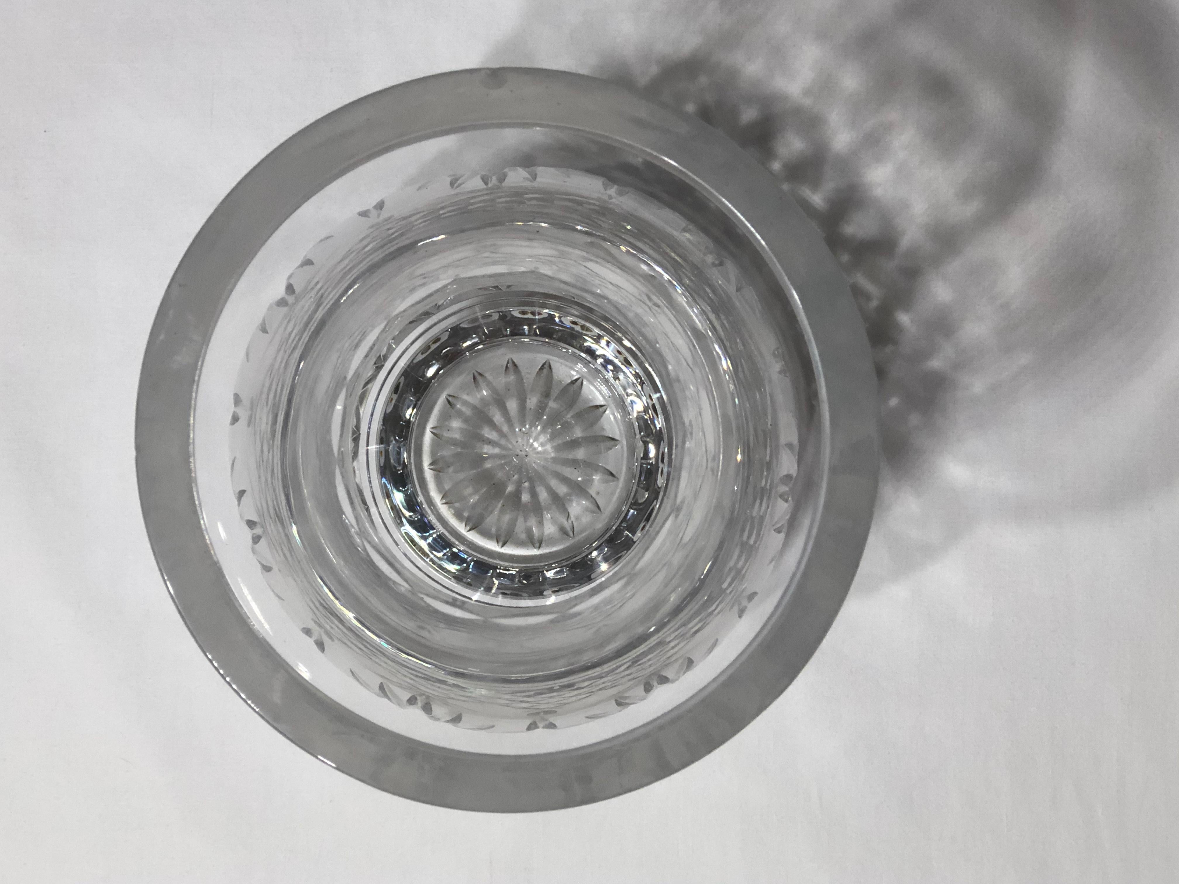 Exquisite Waterford crystal vase that is perfect for floral arrangement and accessory for interior kitchen tables, side tables, etc. The vase is cover is decorative shapes of, starburst, wheat sheaf, vertical ‘X’ motif.
Mark at bottom.