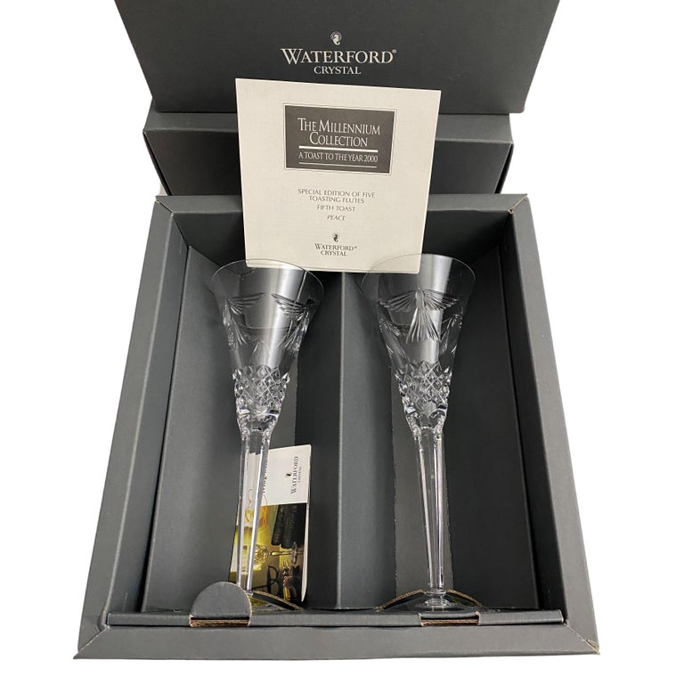https://a.1stdibscdn.com/waterford-peace-crystal-millennium-champagne-toasting-flute-pair-nib-for-sale-picture-4/v_9251/v_131058821629641330587/waterford_millennium_crystal_champagne_toasting_flute_peace_master.jpg?width=768