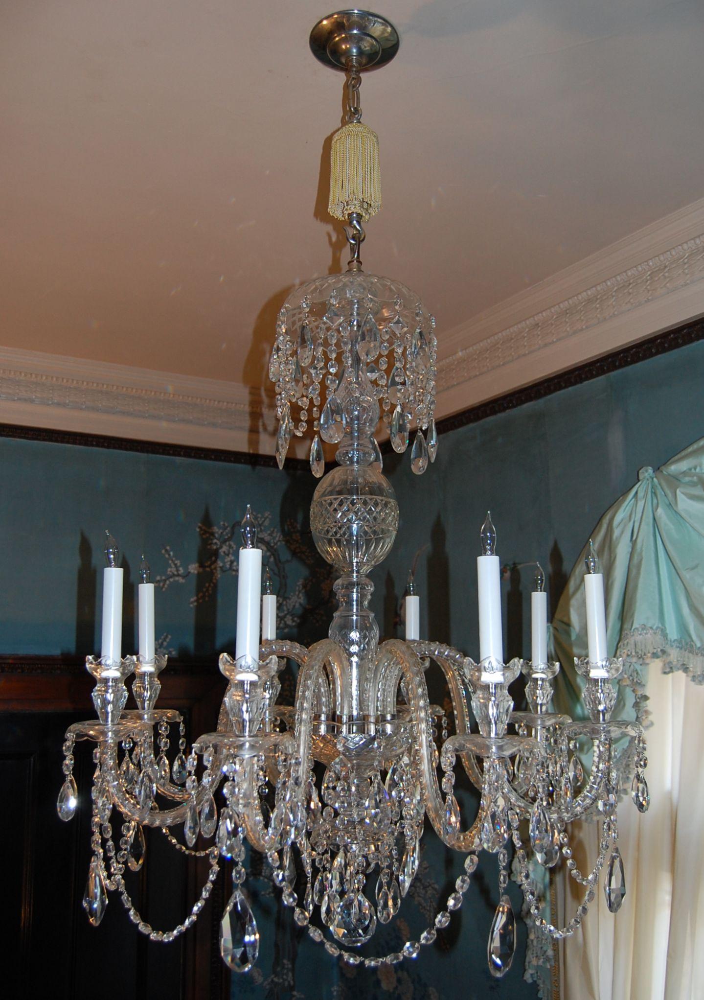 Waterford style eight-light chandelier, recently cleaned and rewired with custom silk tassel, hook and canopy. Originally purchased from Nesle Lighting in New York for a Pittsburgh client. The fixture without the tassel measures 42