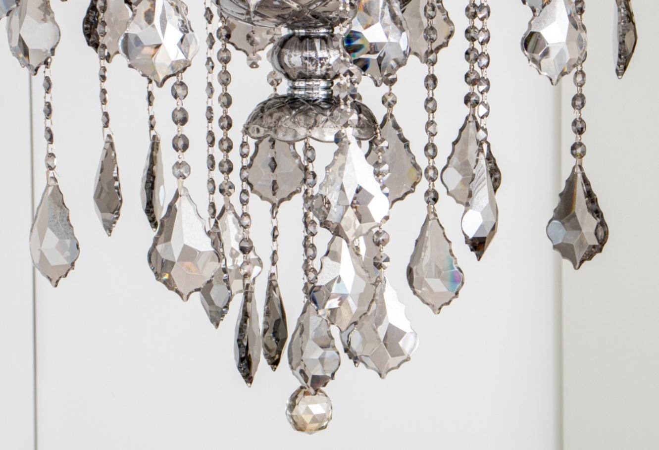 Waterford style twenty-arm smoky crystal glass chandelier with hanging pendants and candlestick form lights. 44