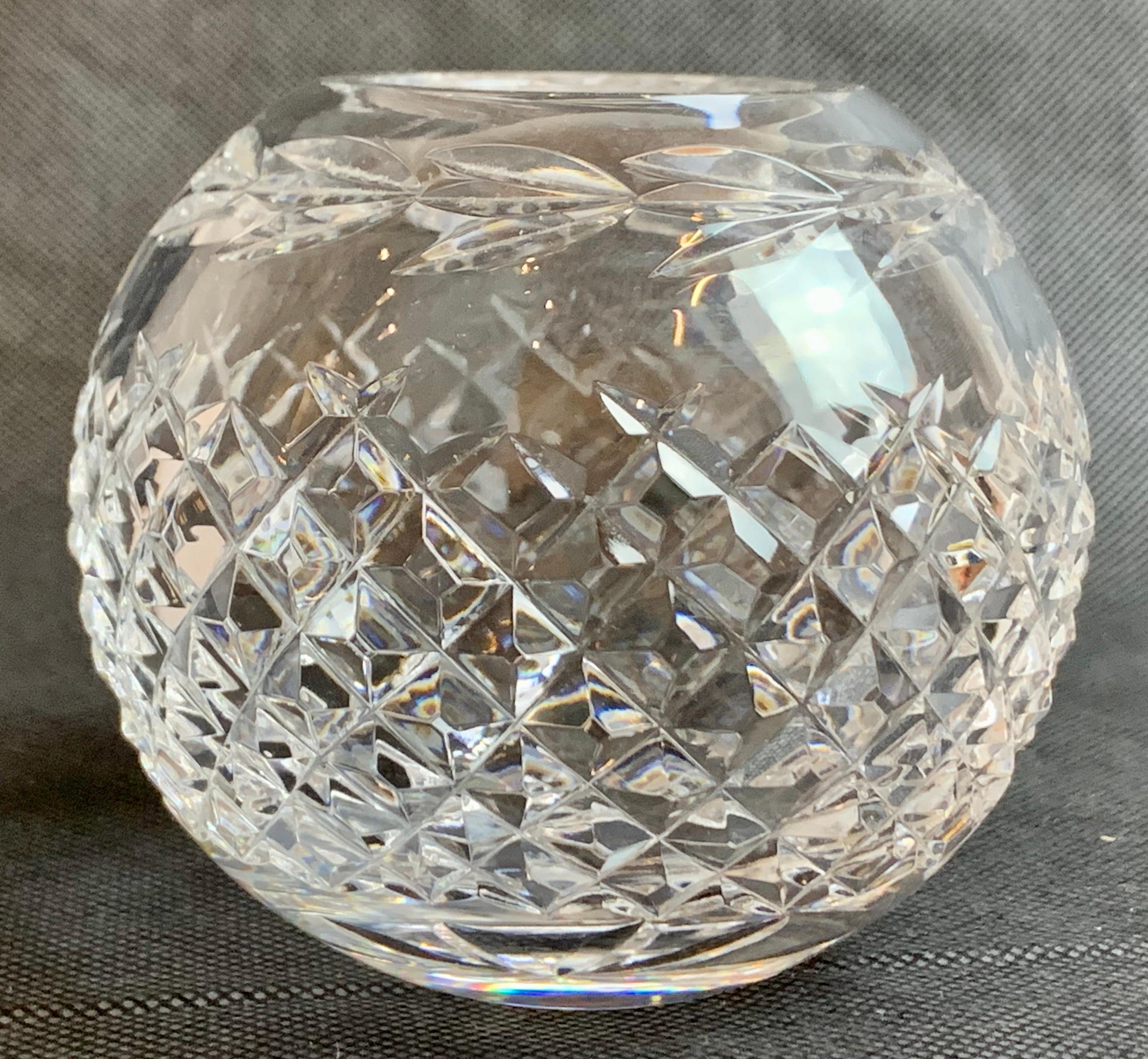 Waterford's glandore pattern cut lead crystal rose bowl. The bowl has pineapple cutting on the sides. The top portion of the bowl has deeply cut leaves in a horizontal pattern. Discontinued in circa 1976. 
