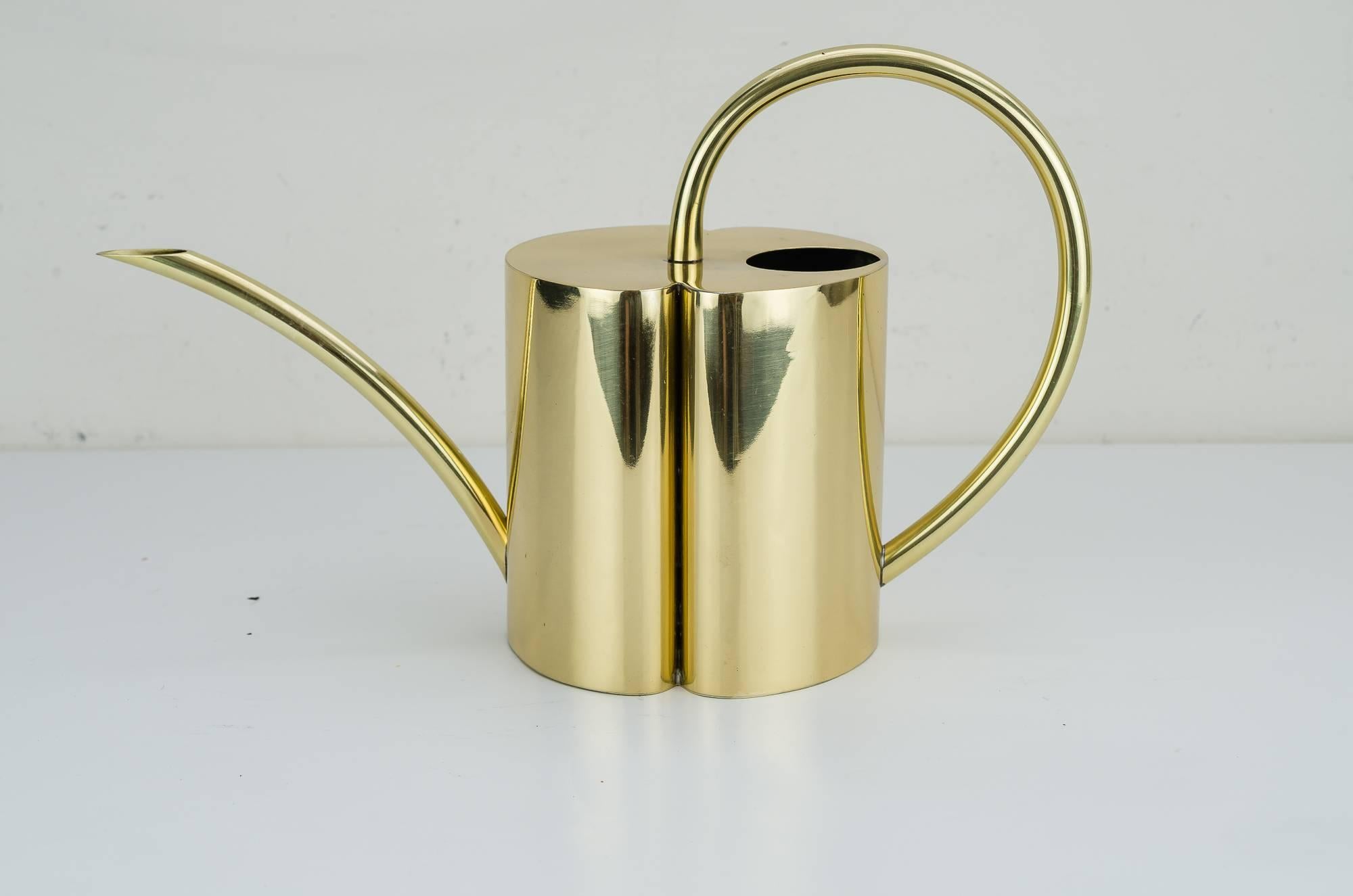 Watering can, 1930s
polished brass
stove enameled.