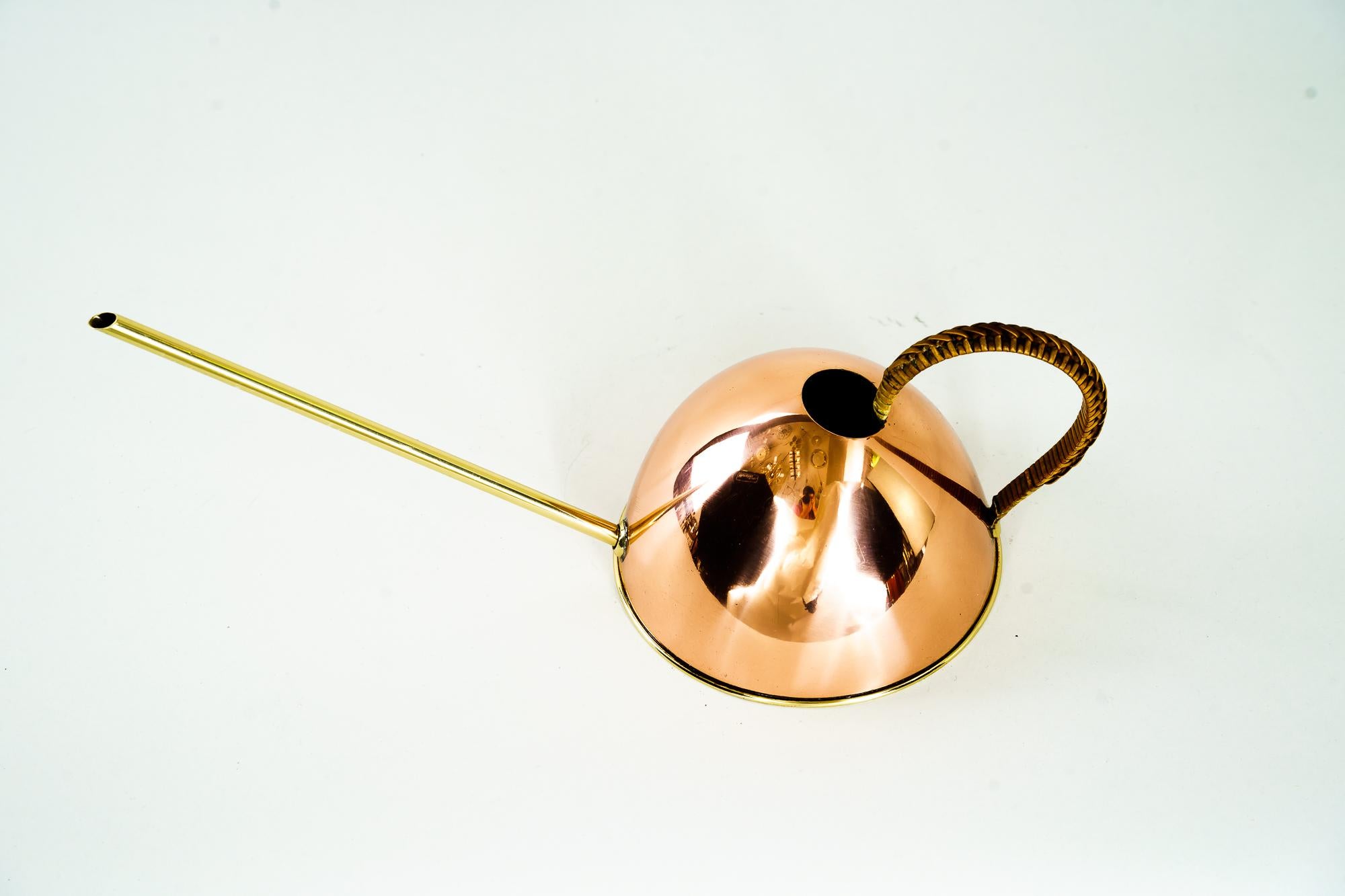 Watering can, Vienna, around 1960s
copper and brass 
Polished and stove enamelled.