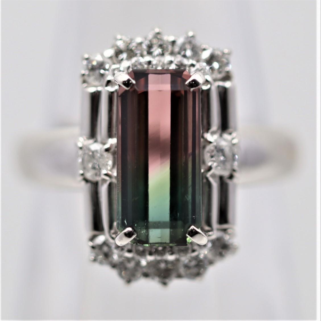 A simple yet unique and eye-catching ring featuring a bi-color tourmaline (green and pink) giving it the trade name watermelon tourmaline. It weighs 2.68 carats and is accented by 0.64 carats of round brilliant-cut diamonds set around it.