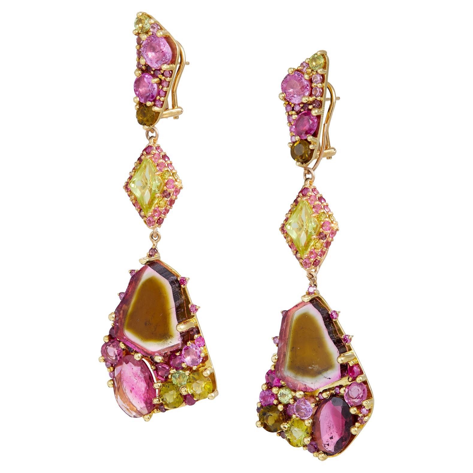 Honeydew jeweled adjustable earrings in 18k gold designed with adjustable lengths these drop style multiple length earrings are decorated with hpht pink diamonds 1.0 CTS, curated hand cut watermelon tourmalines 23.47 CTS, Peridots 2.43 CTS, pink