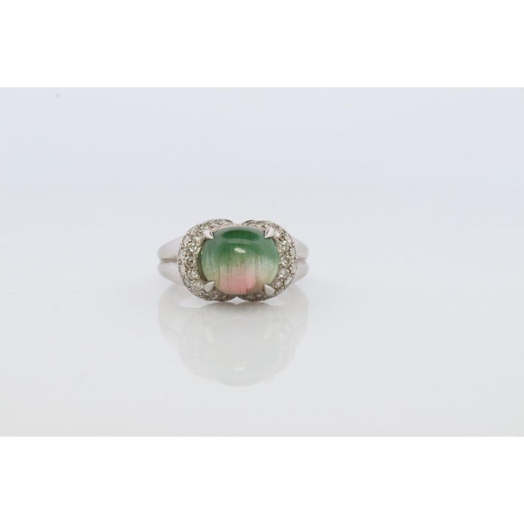 Vintage
Size: 6 US
Materials: Gold, Platinum
Gemstone: Tourmaline
Gem color: Green

Band color: White

Stunning TOURMALINE ring.

Appraised at $5850. Appraisal is included.

Watermelon Color with a Cats Eye effect.

Tourmaline has beautiful internal