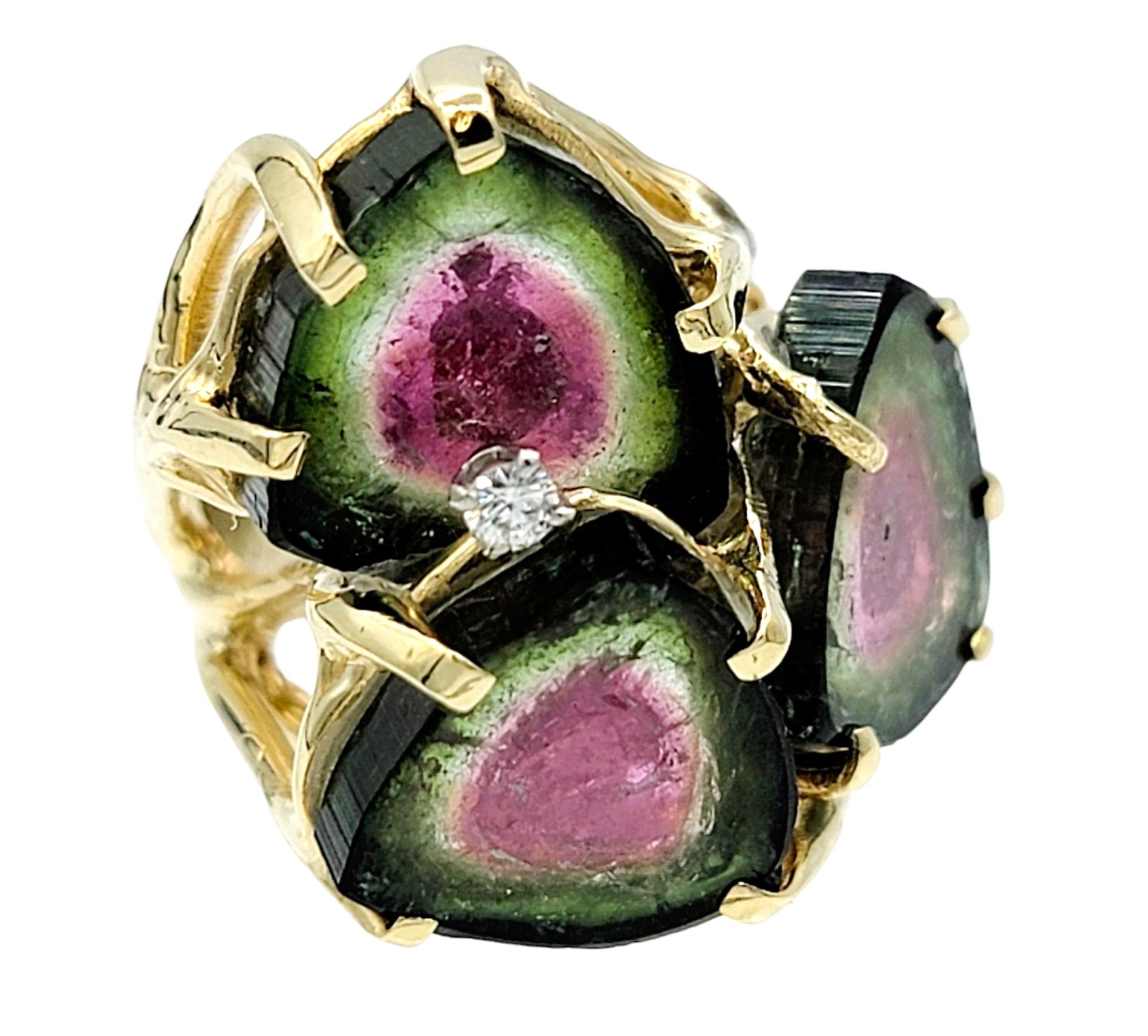 Ring Size: 6.5

Indulge in the enchanting beauty of this 14 karat yellow gold cocktail ring, a masterpiece that elegantly captures nature's splendor. Three mesmerizing watermelon tourmaline slices take center stage, each meticulously prong set to
