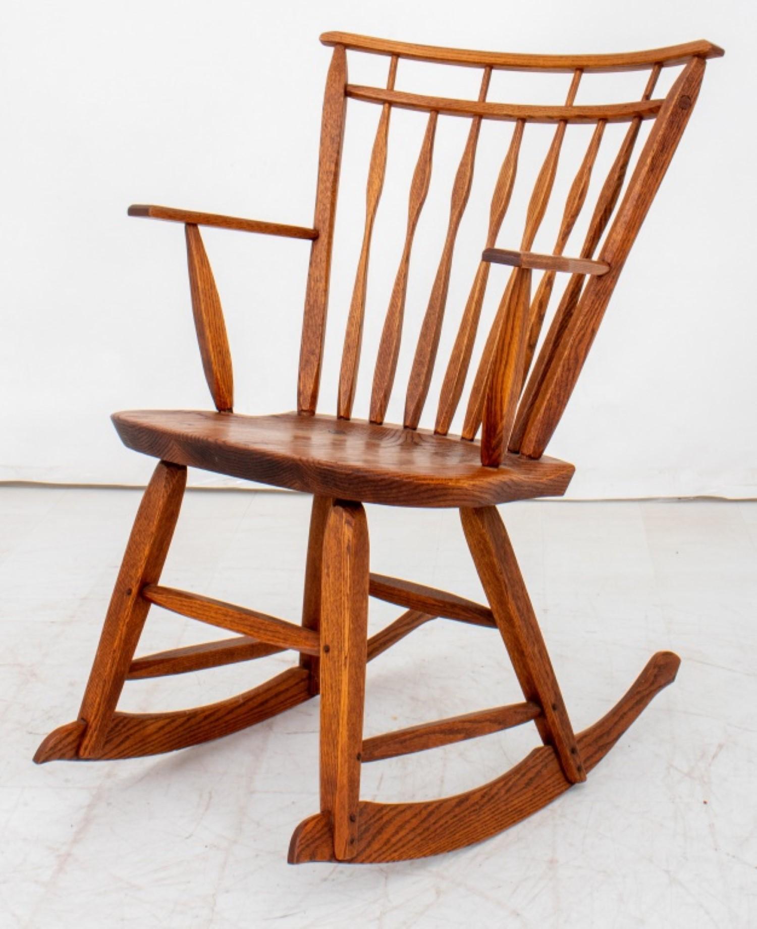 Sturdy oak construction: Oak is a popular choice for rocking chairs due to its strength and durability. Picture the warm tones and natural grain patterns of the wood, adding a touch of rustic charm to your nursery.

Handcrafted appeal: Knowing it's
