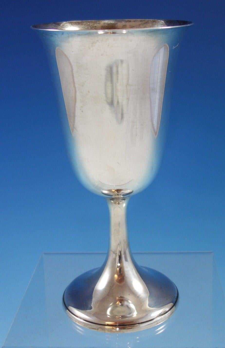 Watrous sterling silver water goblet #PP51 6 1/2 x 3 1/4 (#2613)

Wonderful watrous sterling silver water goblet marked #PP51. The goblet measures 6 1/2 tall x 3 1/4 and weighs 4.2 troy ounces. It is not monogrammed and is in very good condition.