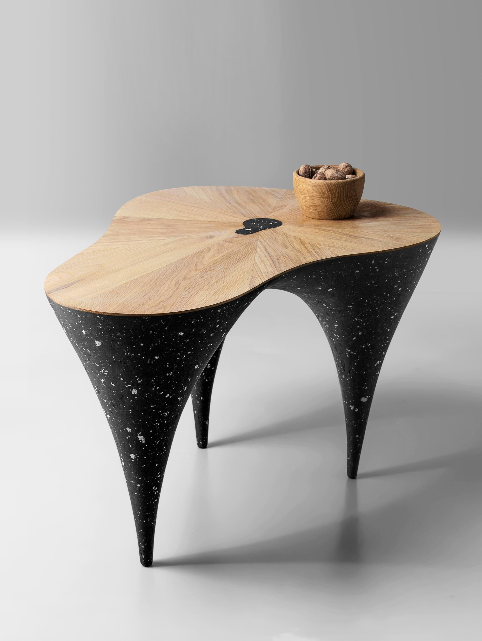 Wave Coffee Table by Kasanai
Dimensions: D 72 x W 55 x H 46 cm.
Materials: Oak, mixed material (cement, recycled paper, glue, and paint).
12 kg

The visual inspiration for the coffee table is a combination of natural wood and concrete. These two