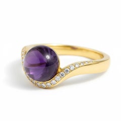 Wave Design Amethyst and Topaz Ring in silver, gold