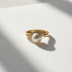Wave Design White Freshwater Pearl and Topaz Ring in silver, gold