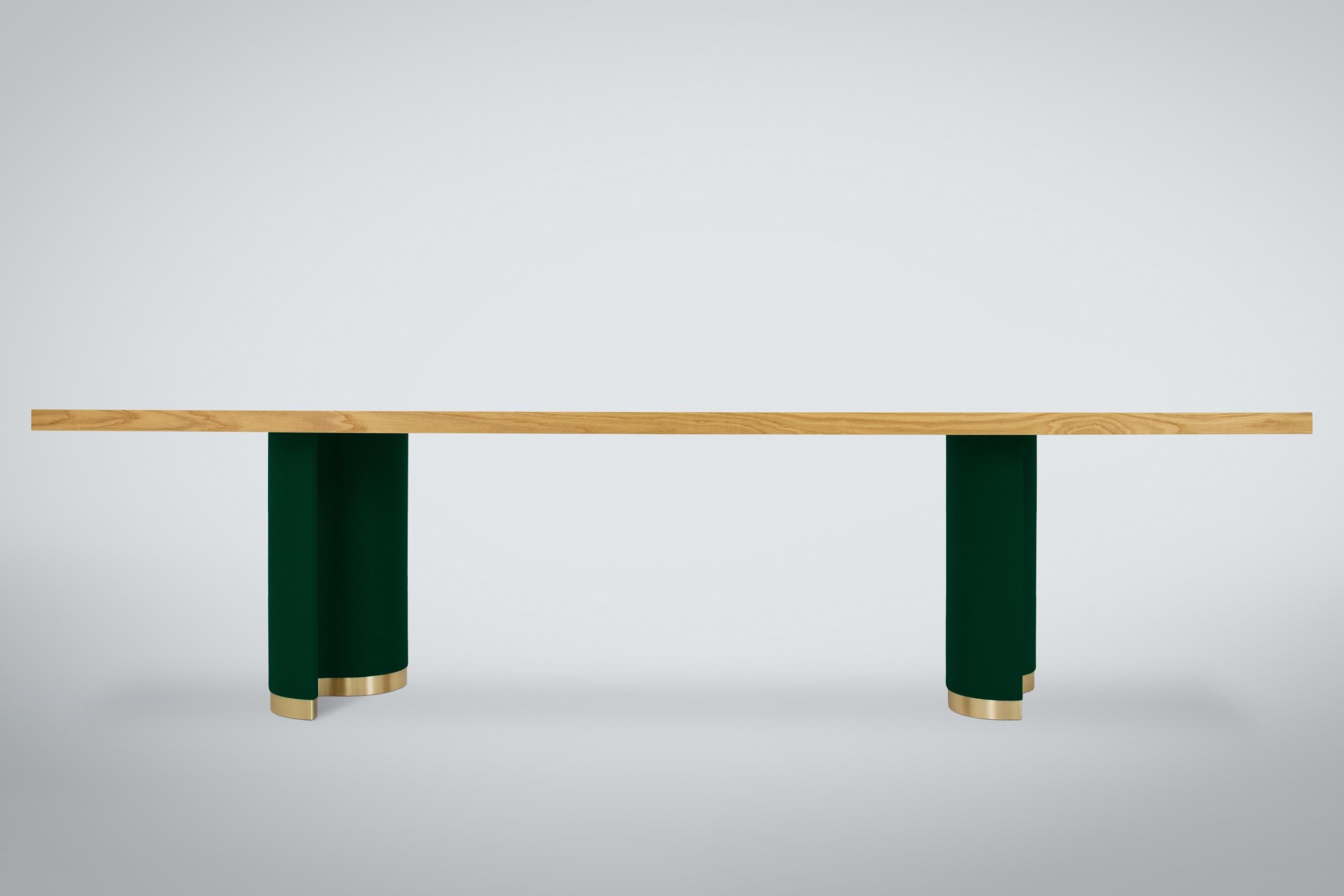 Our Wave dining table shown with a white oak top, suede upholstered bases and brass terminations.

All of our pieces are made to order with custom sizes available upon request. Additional options include but are not limited to wood species,