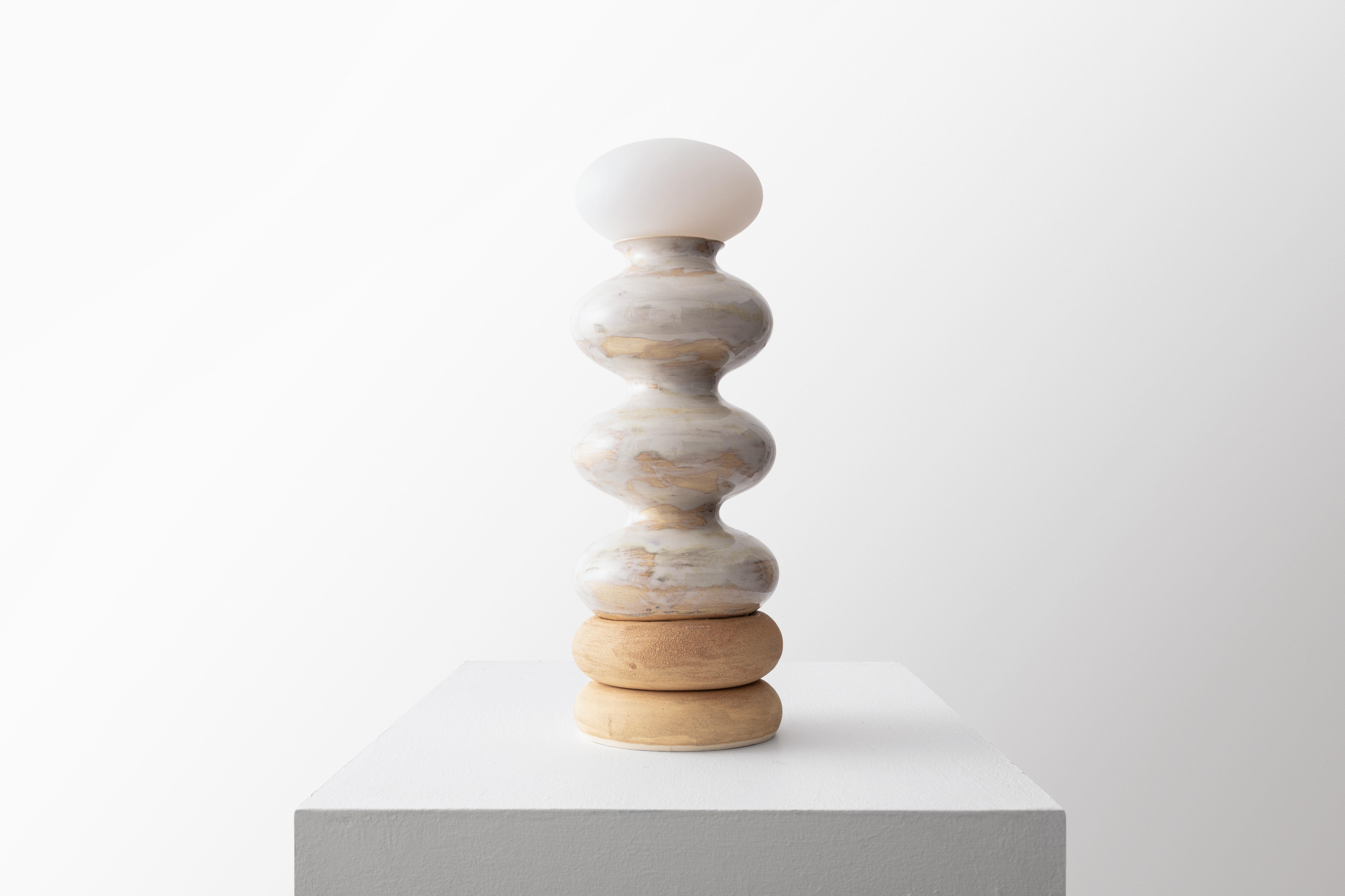 Wave Form Slumped Table Lamp by Forma Rosa Studio
Dimensions: D 14 x W 14 x H 30.5 cm.
Materials: Ceramic.

Our Wave Form Lamp 