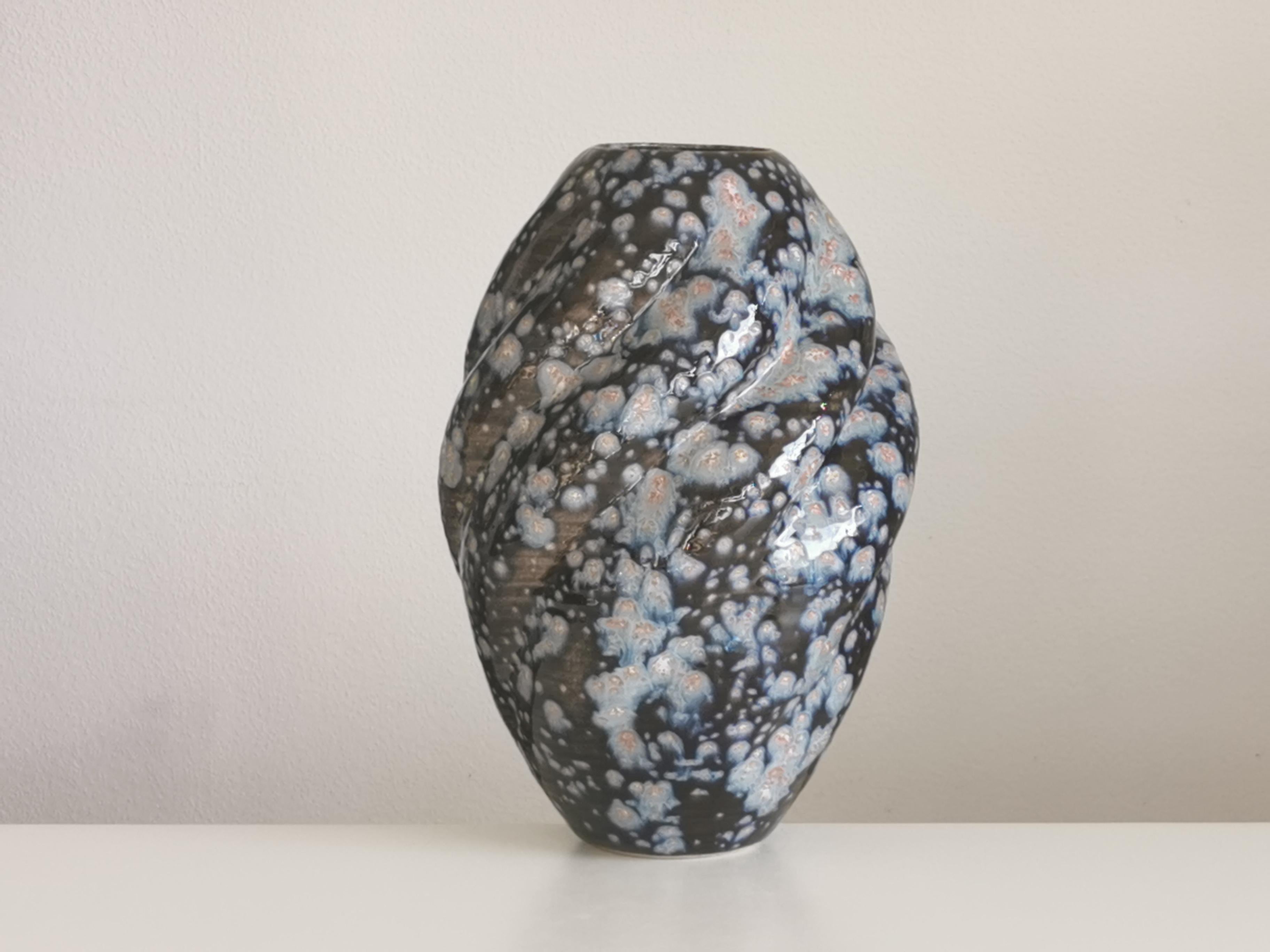 No. 90 tall wave form with a blue galactic glaze. Sumptuous medium sized ceramic vessel from ceramic artist Nicholas Arroyave-Portela.

White St.Thomas clay, Stoneware glazes, multi fired to cone 6 (1223 degrees)

Made in 2022

Measures: H 40