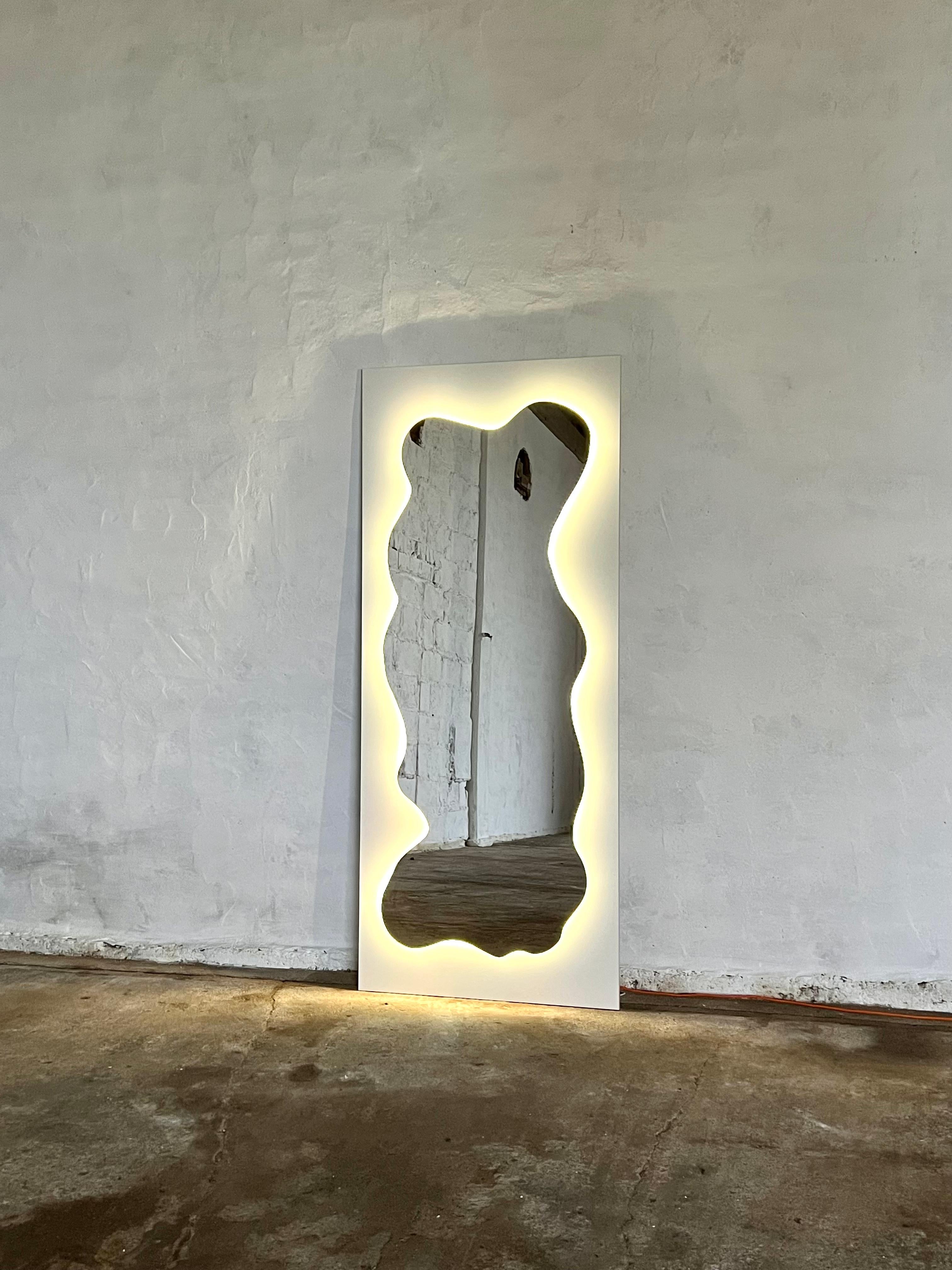Wave Mirror - a floor mirror referring in style to the era of postmodernism. Designed by polish studio - Picco in 2020. Made of furniture board with lighting. It can become a decoration of any interior, both in vintage and modern style.