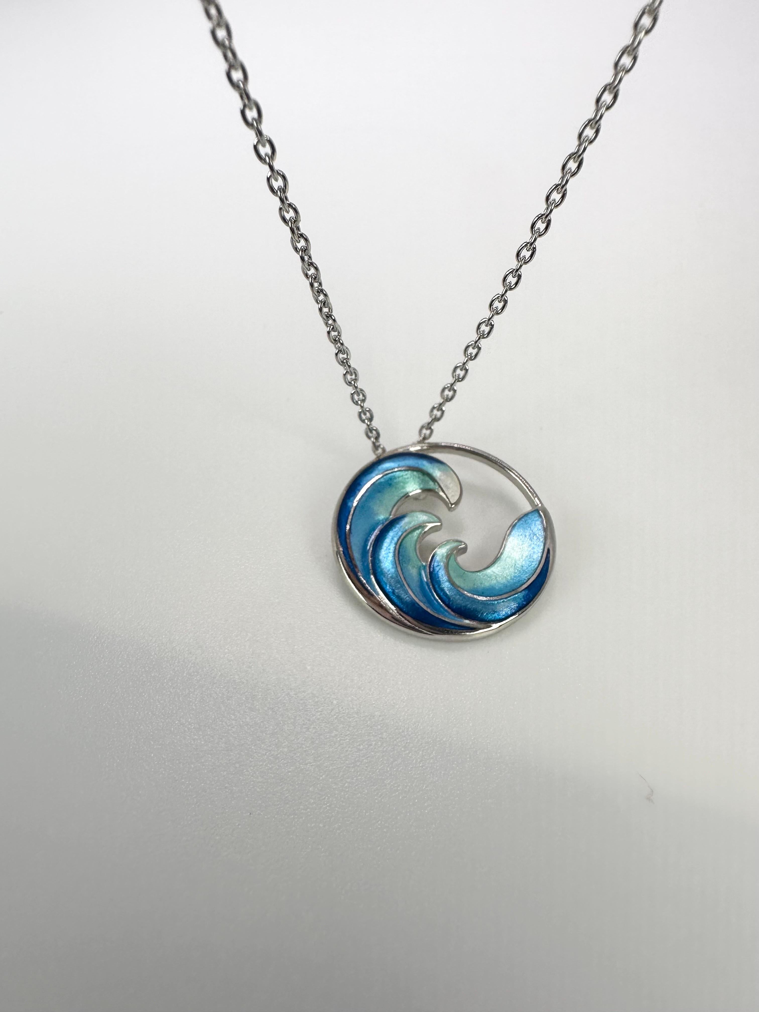 Glass enamel in a unique presentation and design, using array of colors that will never fade. 
METAL: silver 925
Grams:7
Item: 64000002fa
Chain included

WHAT YOU GET AT STAMPAR JEWELERS:
Stampar Jewelers, located in the heart of Jupiter, Florida,