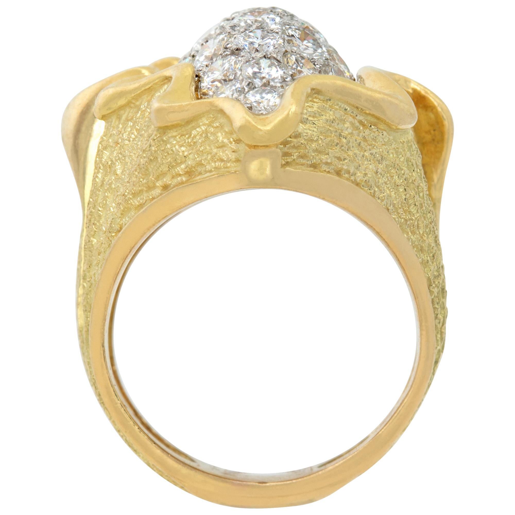 Women's Wave ring with round brilliant cut diamonds set in yellow and white gold. For Sale