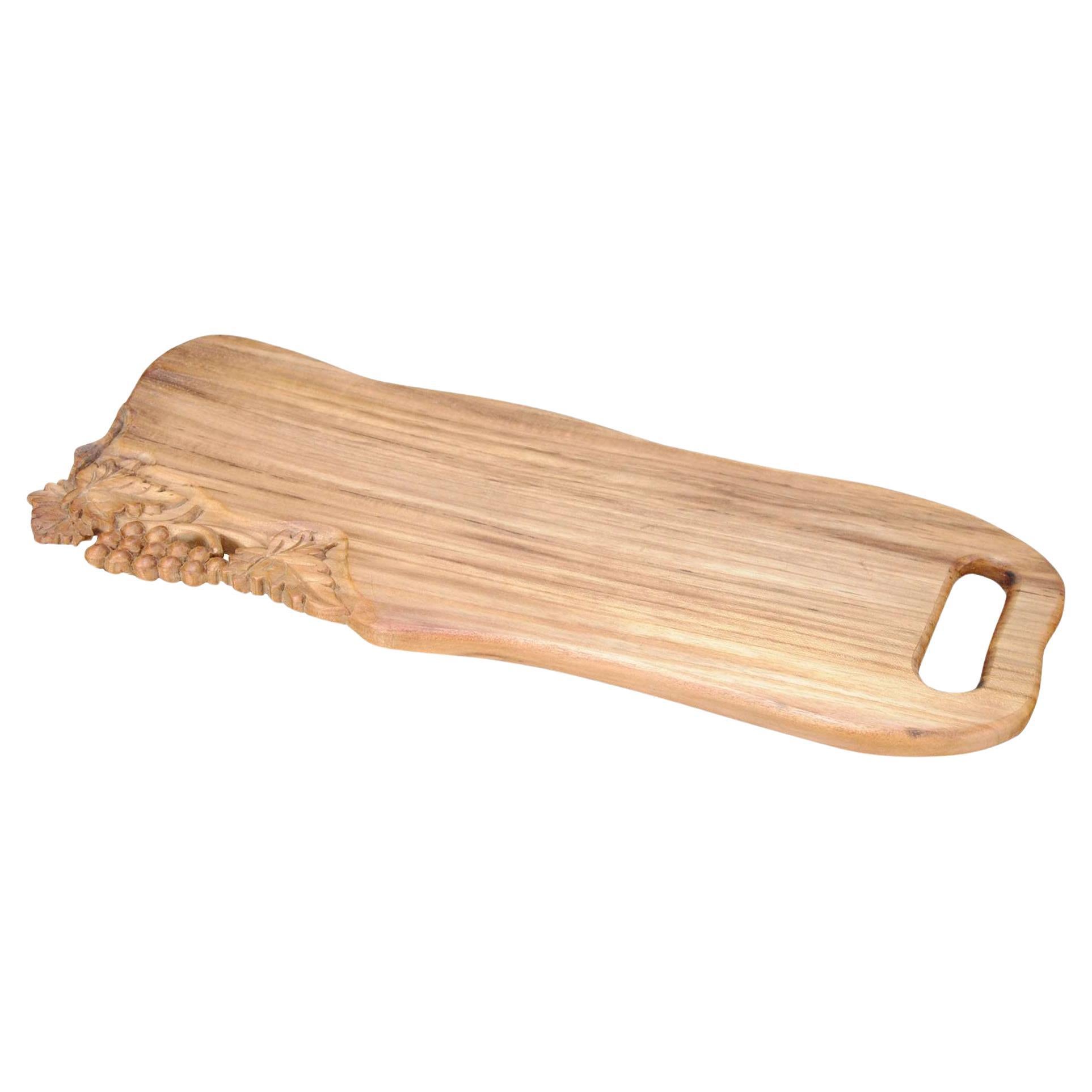 Wave Shaped Teak Cutting Board with Grapes For Sale