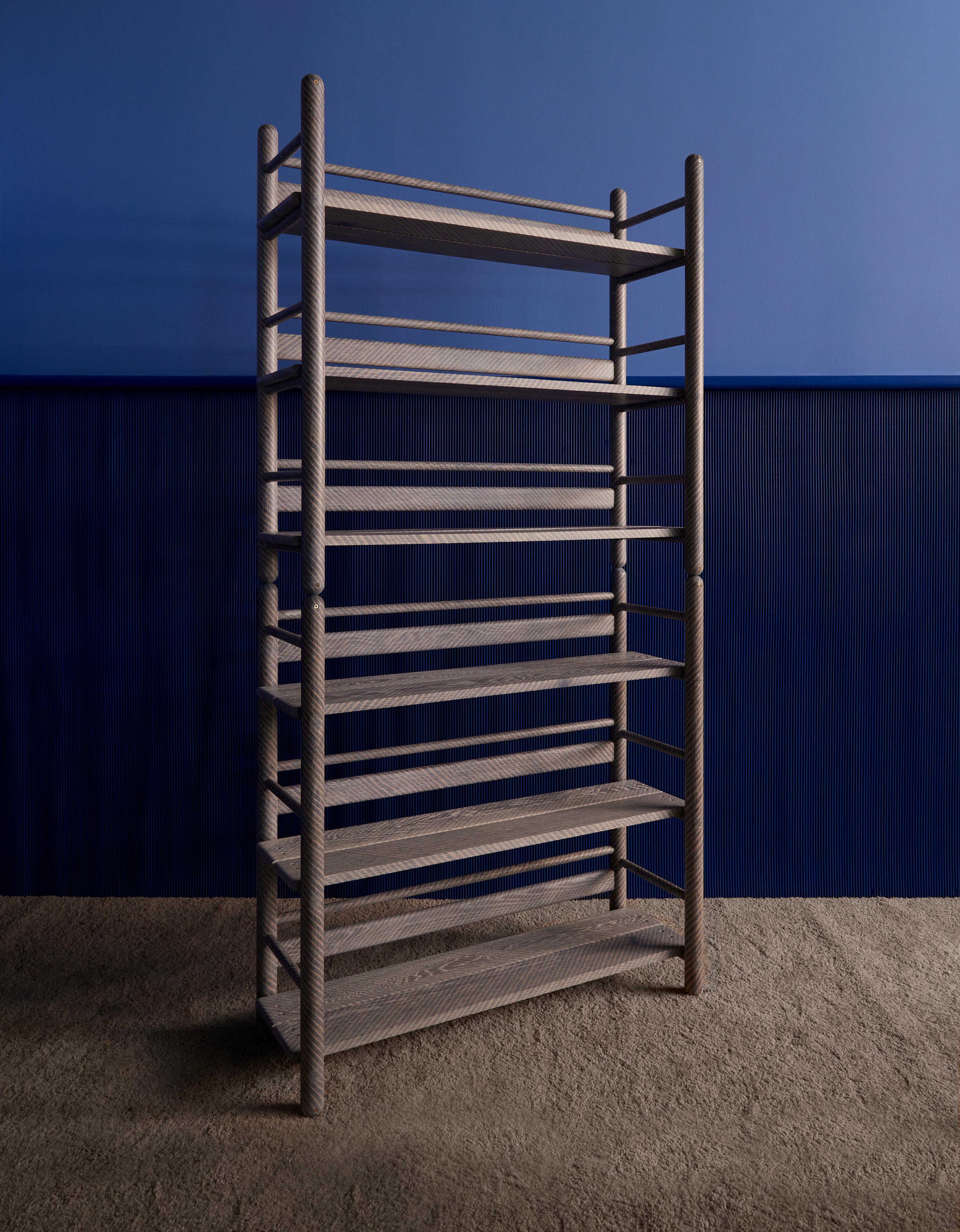 Wave Shelve by Hamilton Holmes
Oxalino Collection 
2020
Dimensions: H 203.2, W 101.6, D 35.6 cm
Materials: White oak and brass screw

This is a freestanding shelving system made from tubular parts and flat shelves. Two units stacked are 80”
