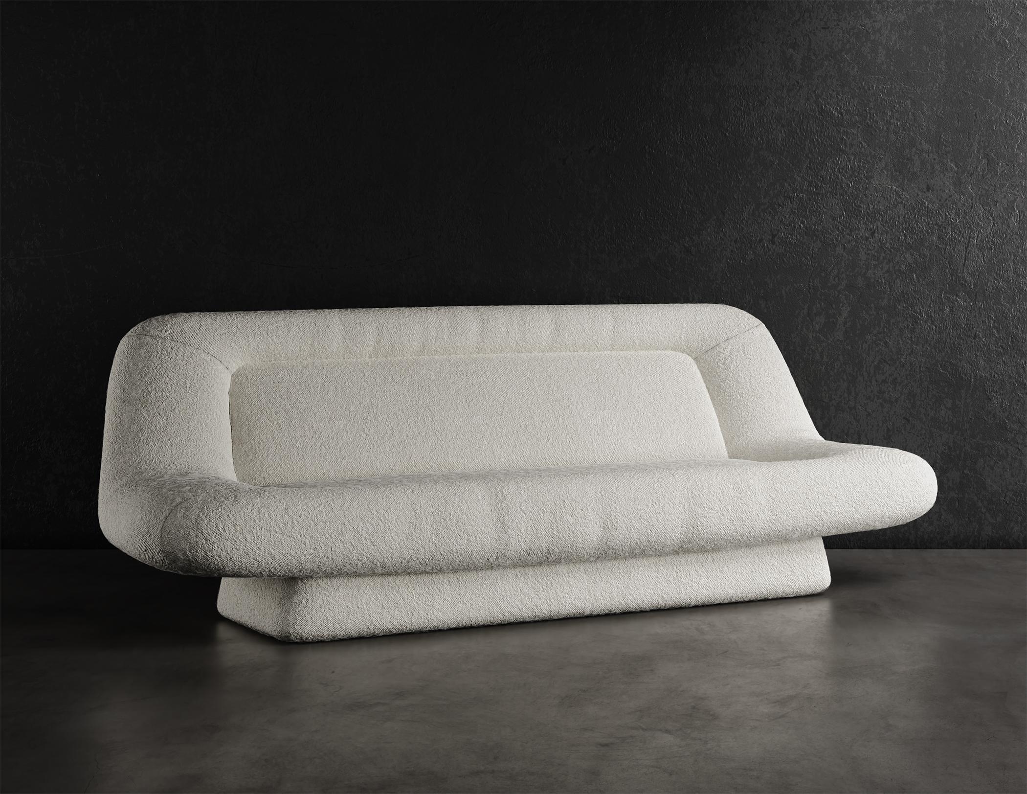 WAVE SOFA - Modern Design in Cloud Boucle in Warm White

The Wave Sofa is a modern and stylish piece of furniture that will add a touch of elegance to any room. It is upholstered in a luxurious cloud boucle fabric in warm white, which not only looks