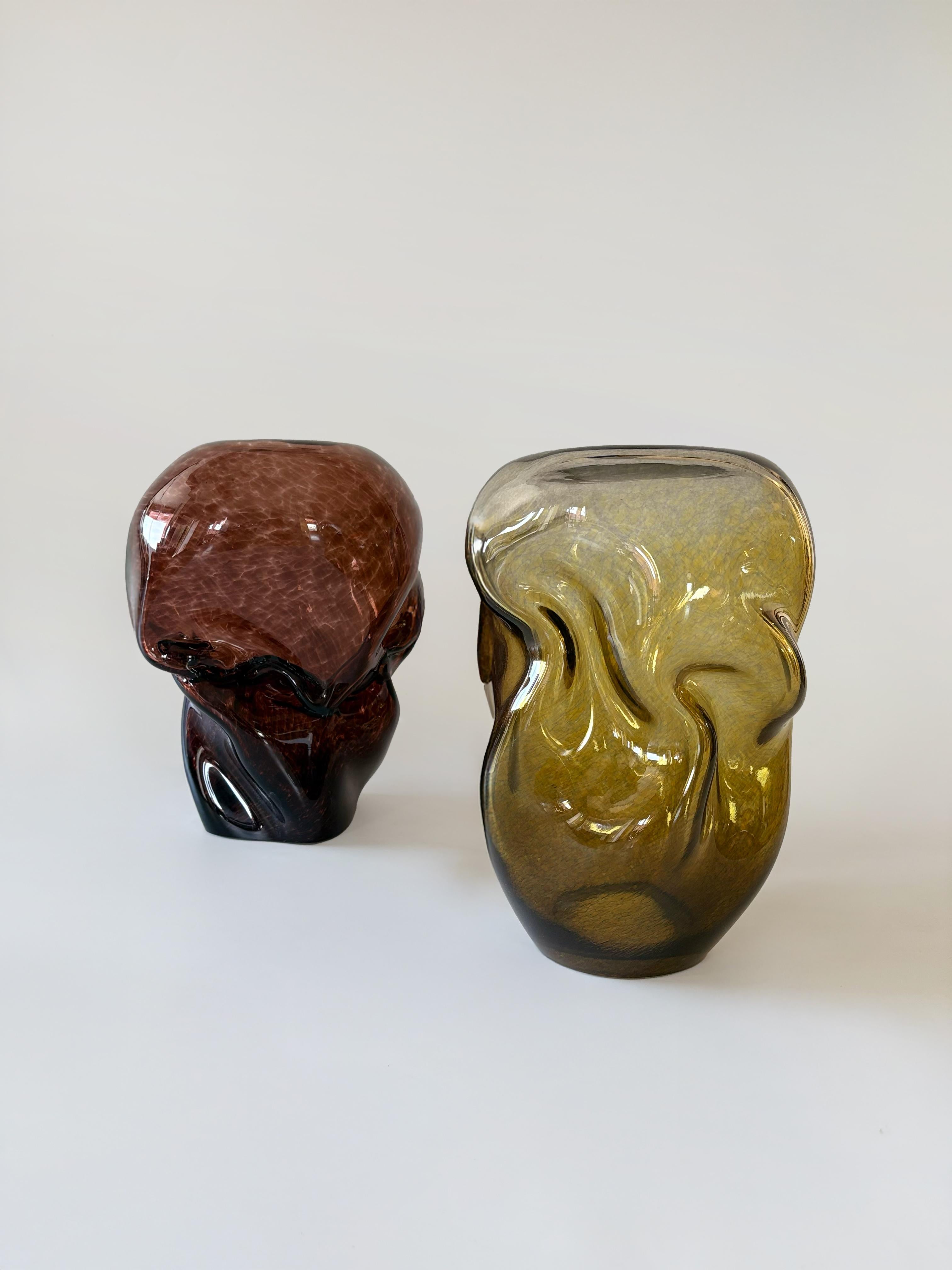 Each Wave Stool / Side Table, crafted with meticulous attention to detail, showcases intriguing shapes. Whether used as a seating option or as a decorative accent, these organically shaped blown-glass stools display a unique approach to their