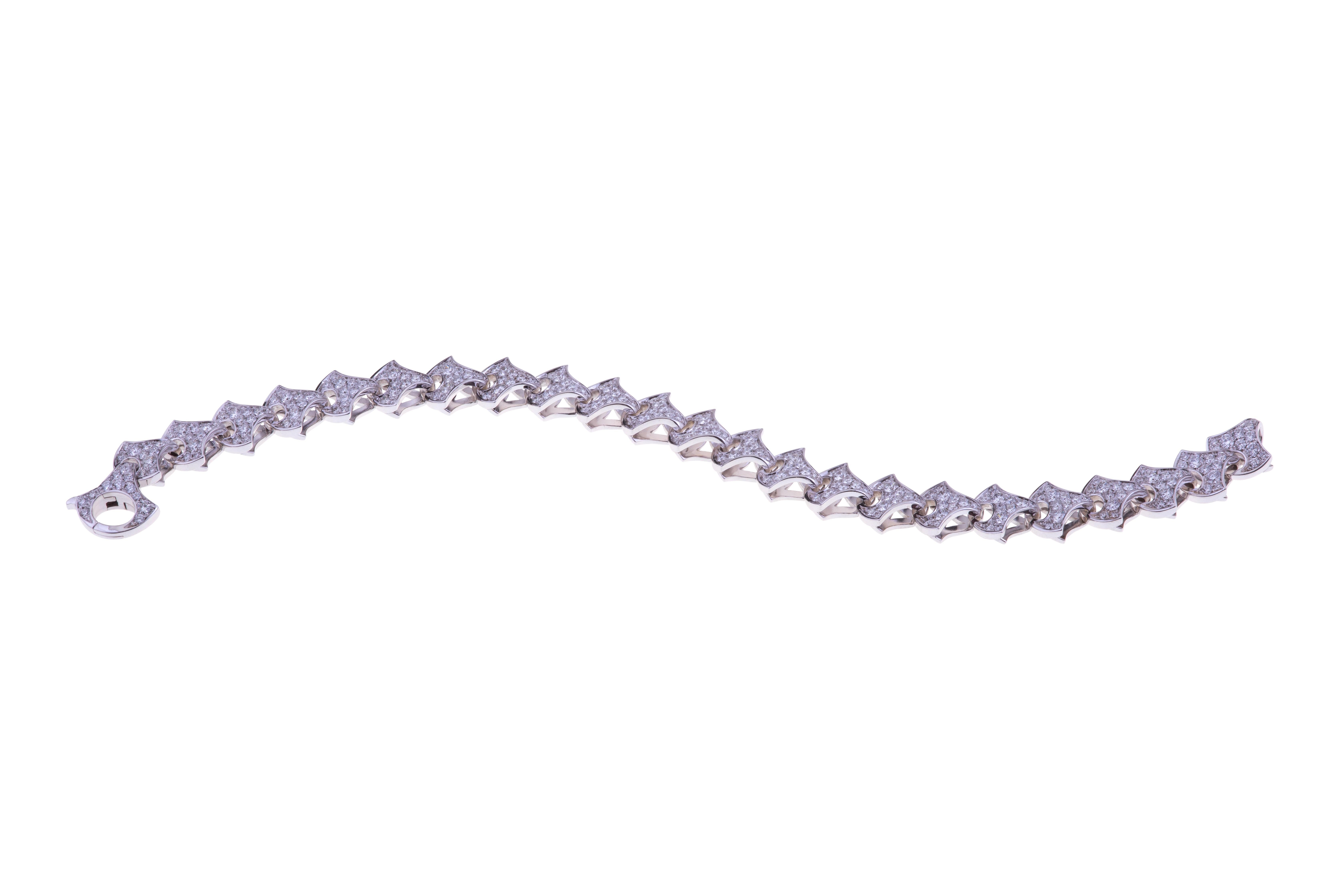 Wave Tennis Bracelet by Angeletti White Gold with Fan Shaped Gold and Diamonds.
Special occasion for this fashionable bracelet with a Unique Design with Diamonds ct. 4.32 G-VS. The Weight of 18kt Gold is around 41 grams. 
Angeletti Boasts an