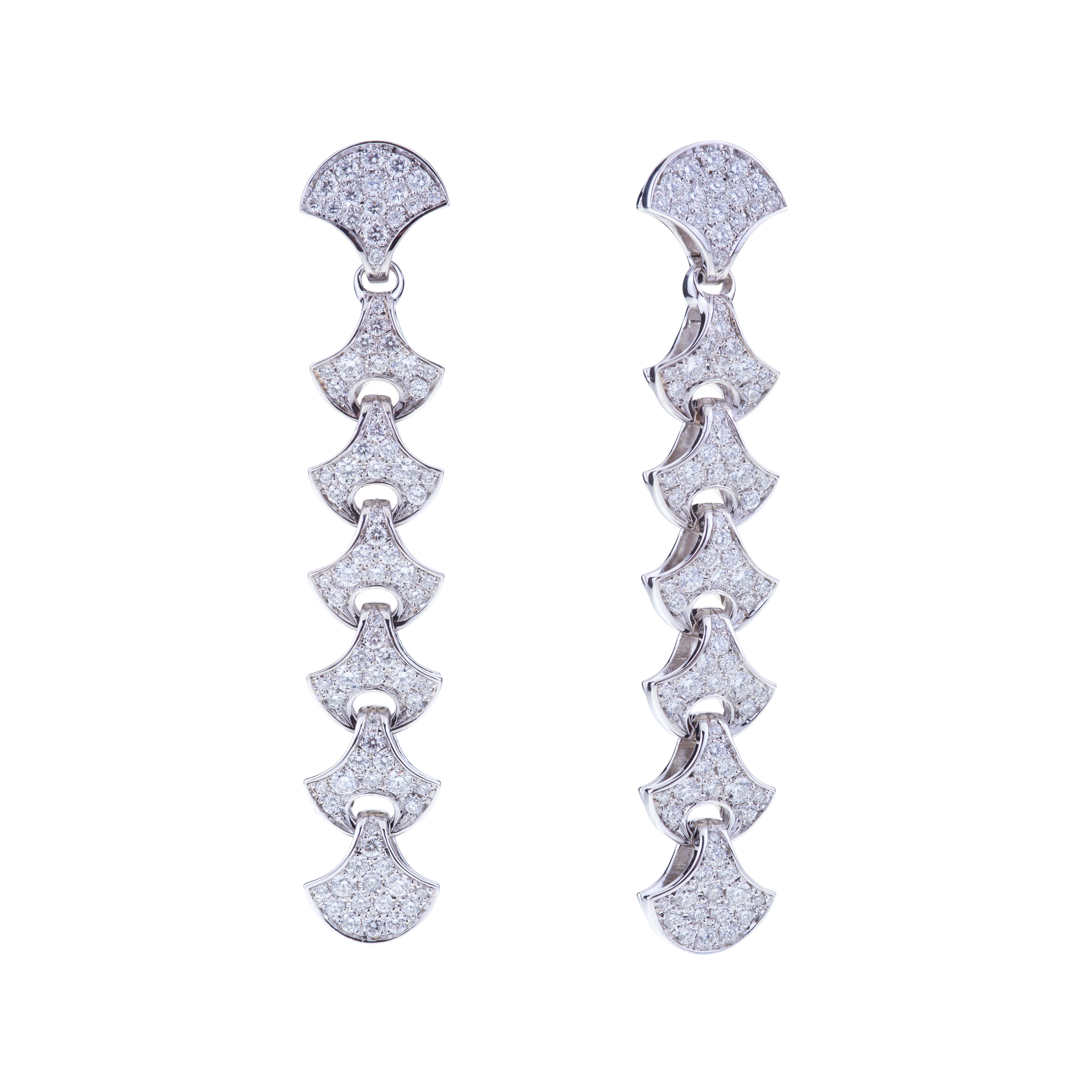 Wave Tennis Earrings by Angeletti White Gold with Fan Shaped Gold and Diamonds.
Special occasion for these Fashionable Earrings with a Unique Design with Diamonds ct. 2.42 G-VS. The Weight of 18kt Gold is around 21 grams. 
Angeletti Boasts an